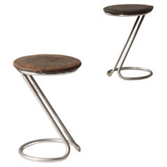 Set of two tubular chrome stools with rich patinated seats, 1940s