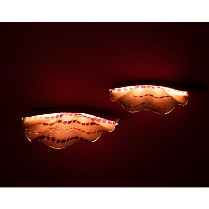Set of Two Turkey Tail wall sconces by Sashi Malik
(One Turkey Tail Large and One, Turkey Tail Small)
Dimensions: D36 x 4 cm (L), D28 x 3 cm (S)
Materials: Silk, Brass

All our lamps can be wired according to each country. If sold to the USA it