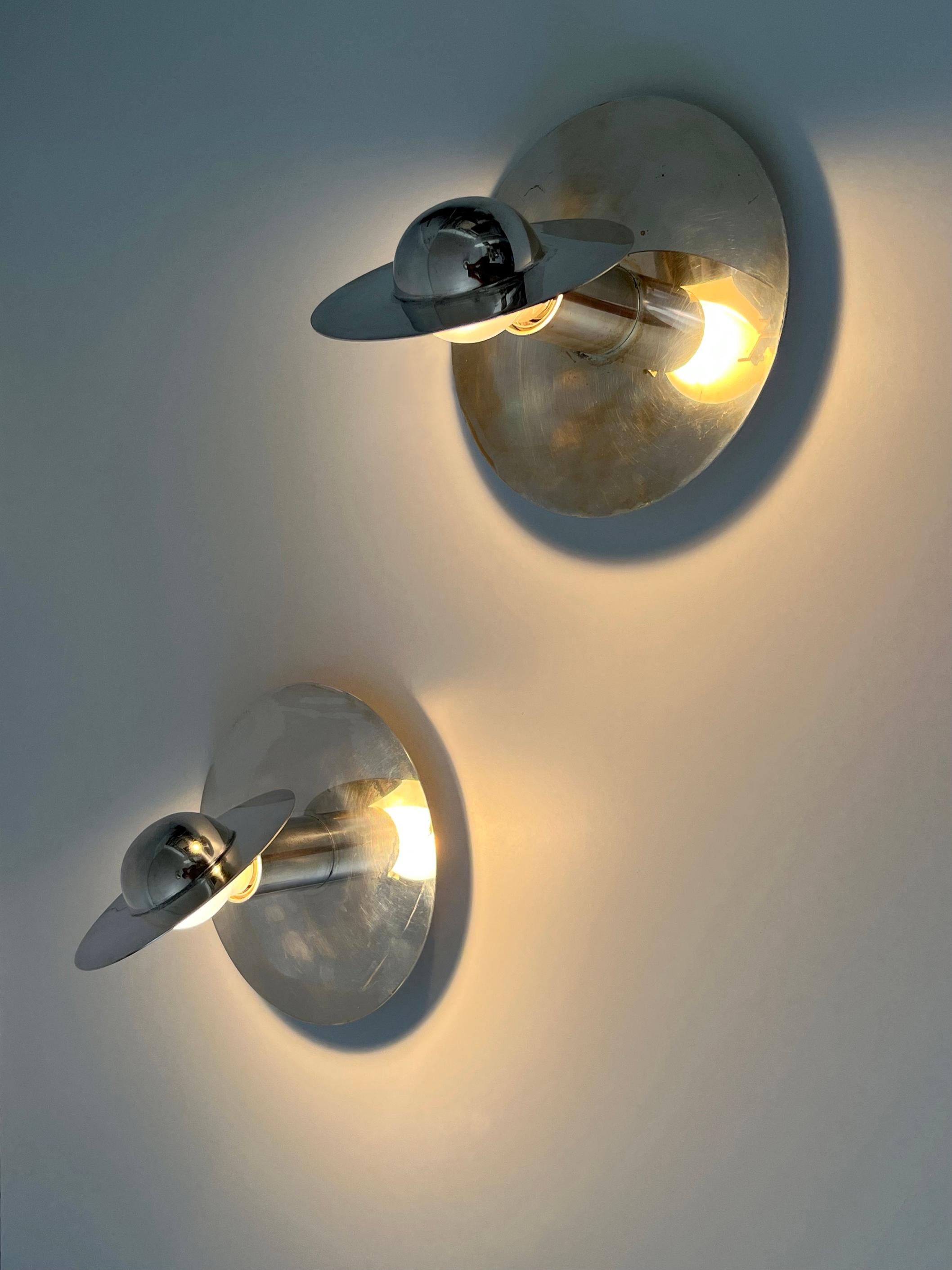 Exceptional, elegant and minimalistic Bauhaus ceiling lamps or sconces.
These unique pieces  are probably prototypes which never went in serial production. Designed and manufactured probably in 1970s, Germany.

A hat-like reflector sits on the E27 /
