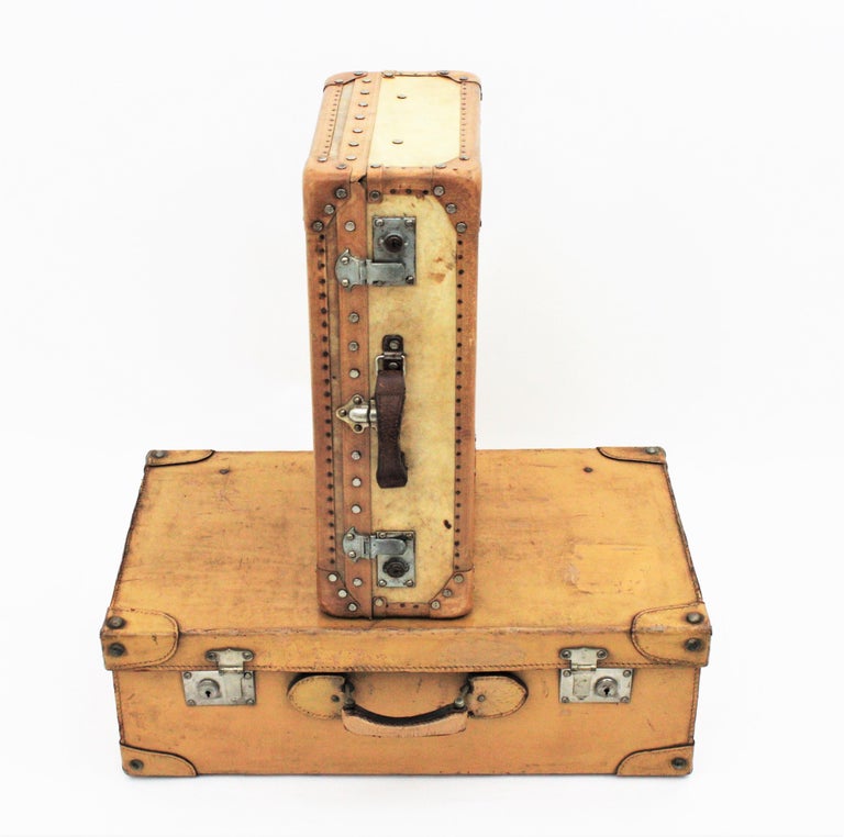 Unmatching Pair of French Suitcases in Vellum and Leather For Sale