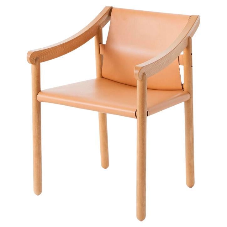 Armchair model 905 designed by Vico Magistretti in 1964.
Manufactured by Cassina in Italy.

A modern chair with a cultural heritage, expression of the creative genius of Vico Magistretti who designed it in 1964. 905 is an elegant chair made of