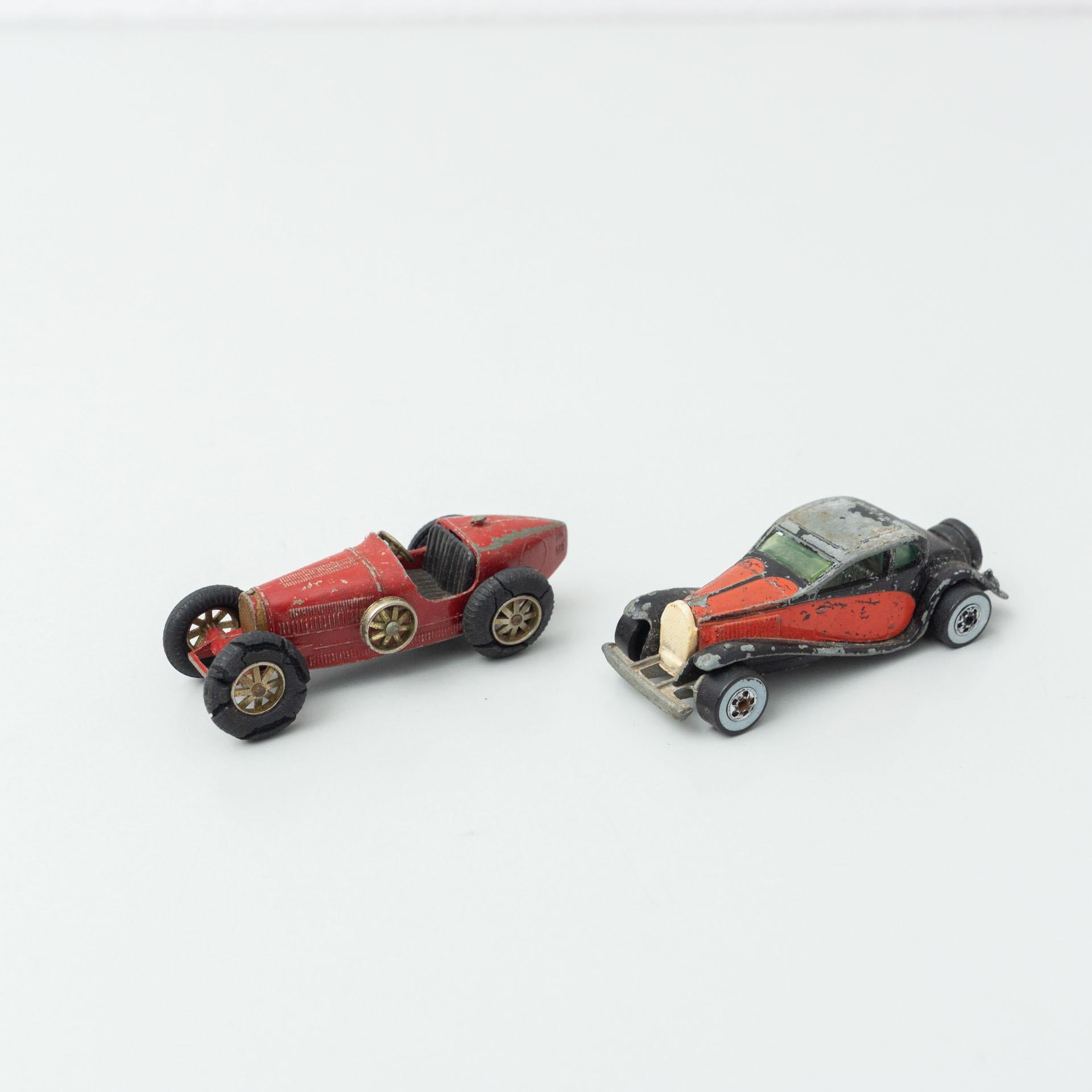 Set of two vintage Bugatti MatchBox car toys.
By MatchBox, circa 1960.

In original condition, with minor wear consistent with age and use, preserving a beautiful patina.

Materials:
Metal
Plastic

Dimensions (each one):
D 8 cm x W 3 cm x