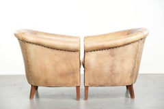 Conjunto de dos sillones club vintage de cuero de vaca de estilo inglés