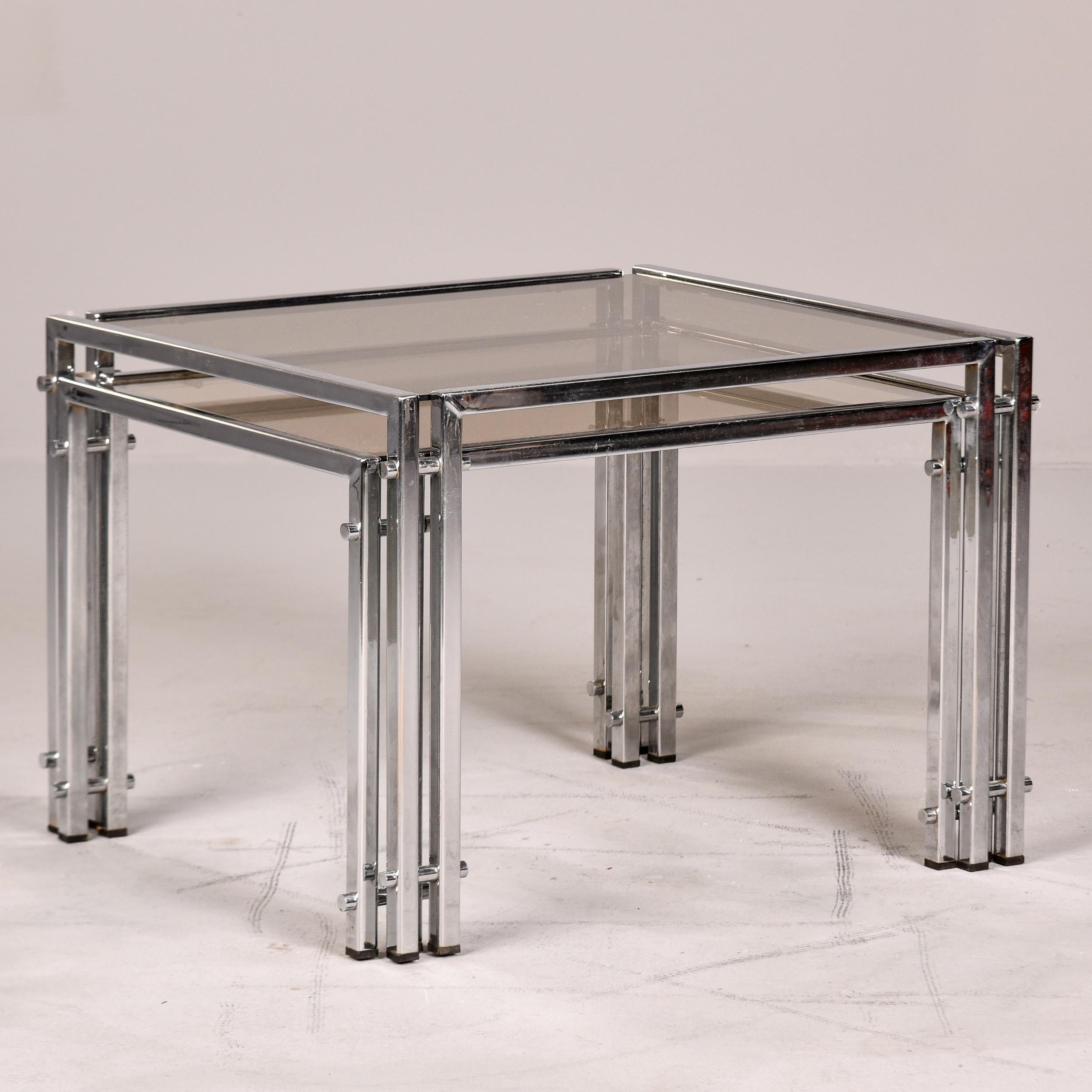 Set of Two Vintage Nesting Tables with Chrome Frames and Pale Smoke Glass Tops In Good Condition For Sale In Troy, MI