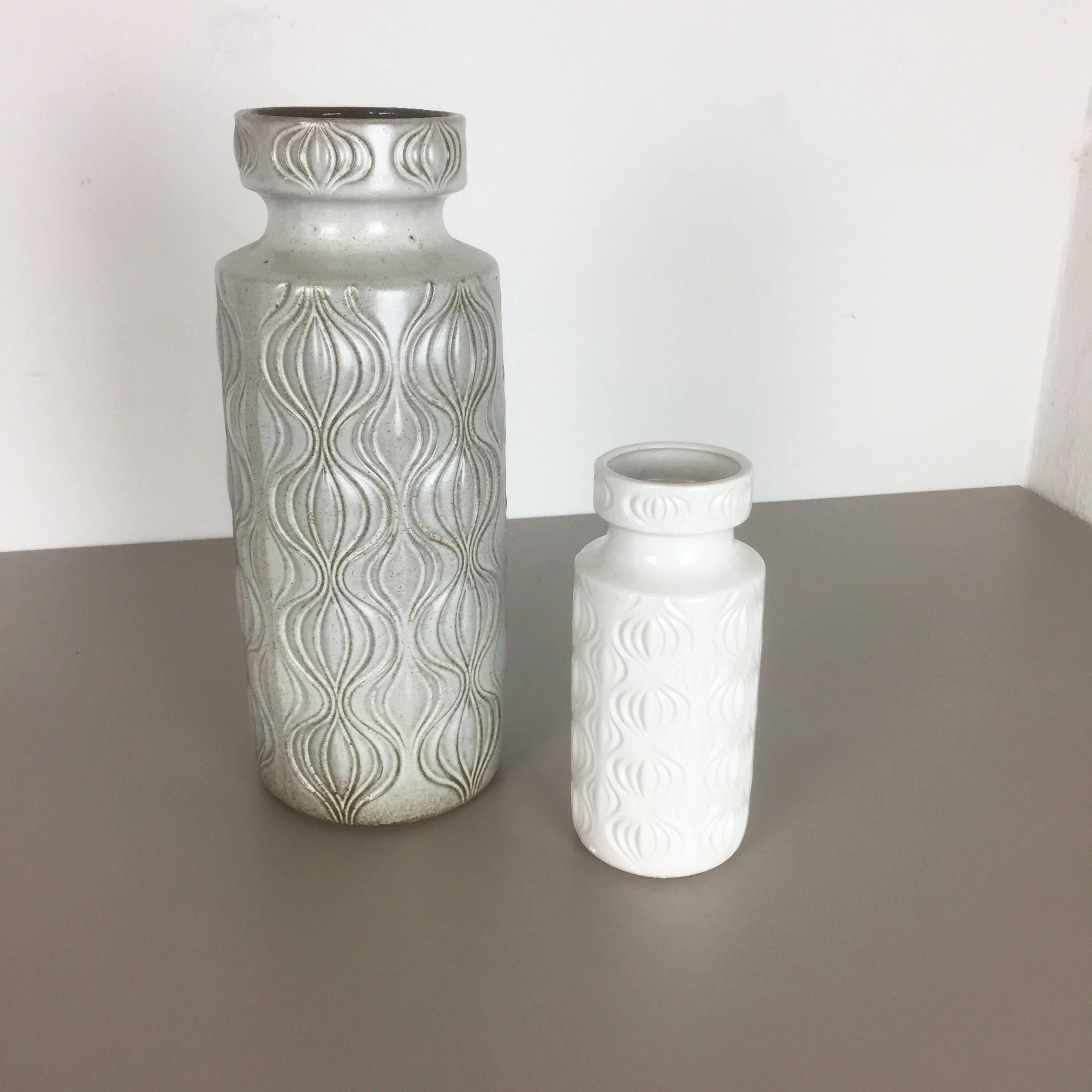 Article:

Set of two fat lava art vases

Model: Onion

Producer:

Scheurich, Germany



Decade:

1970s


Description:

These original vintage vases was produced in the 1970s in Germany. It is made of ceramic pottery in fat lava