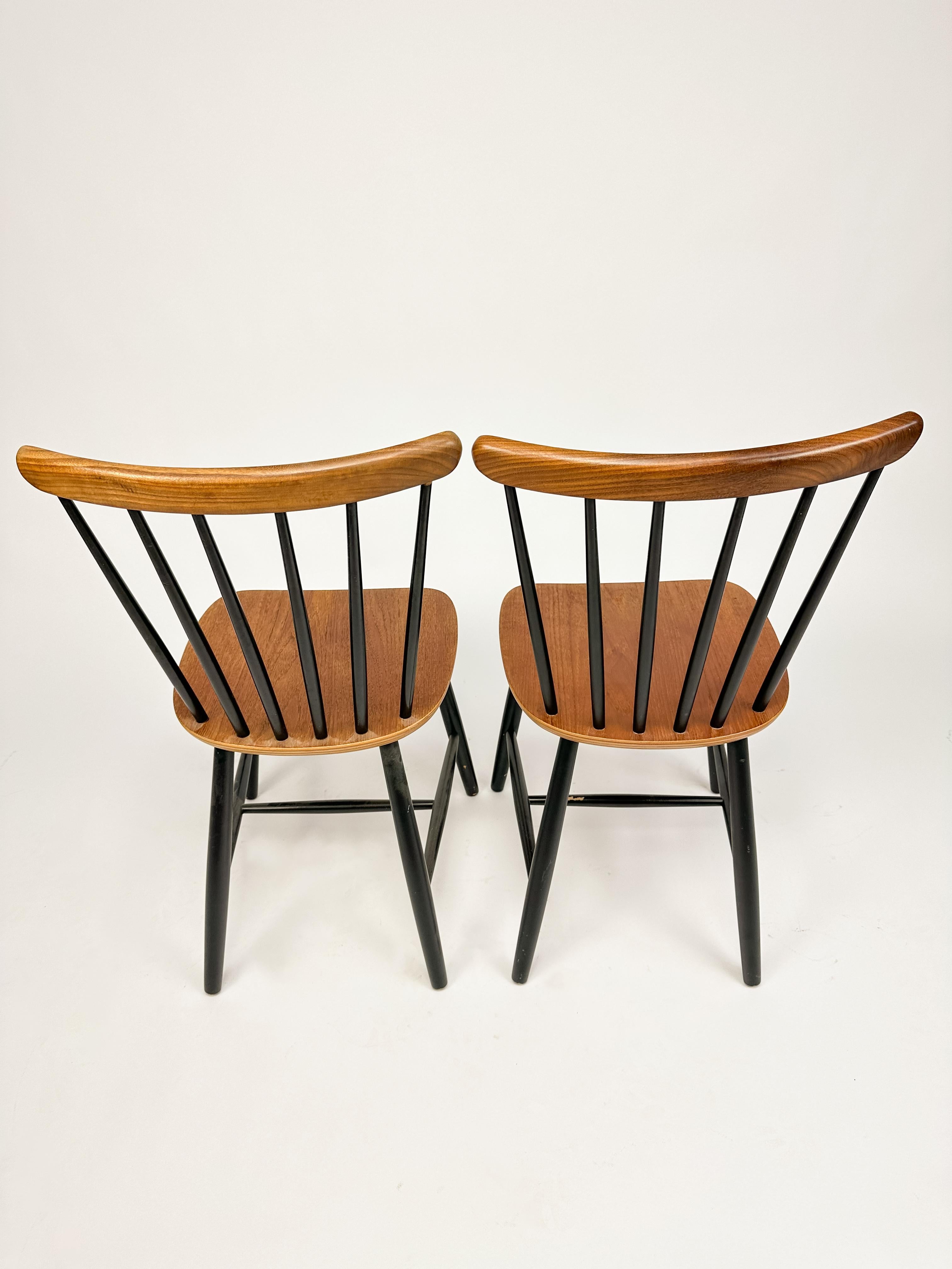 Mid-20th Century Set of Two Vintage Spindle Back Chairs in the style of Tapiovaara For Sale
