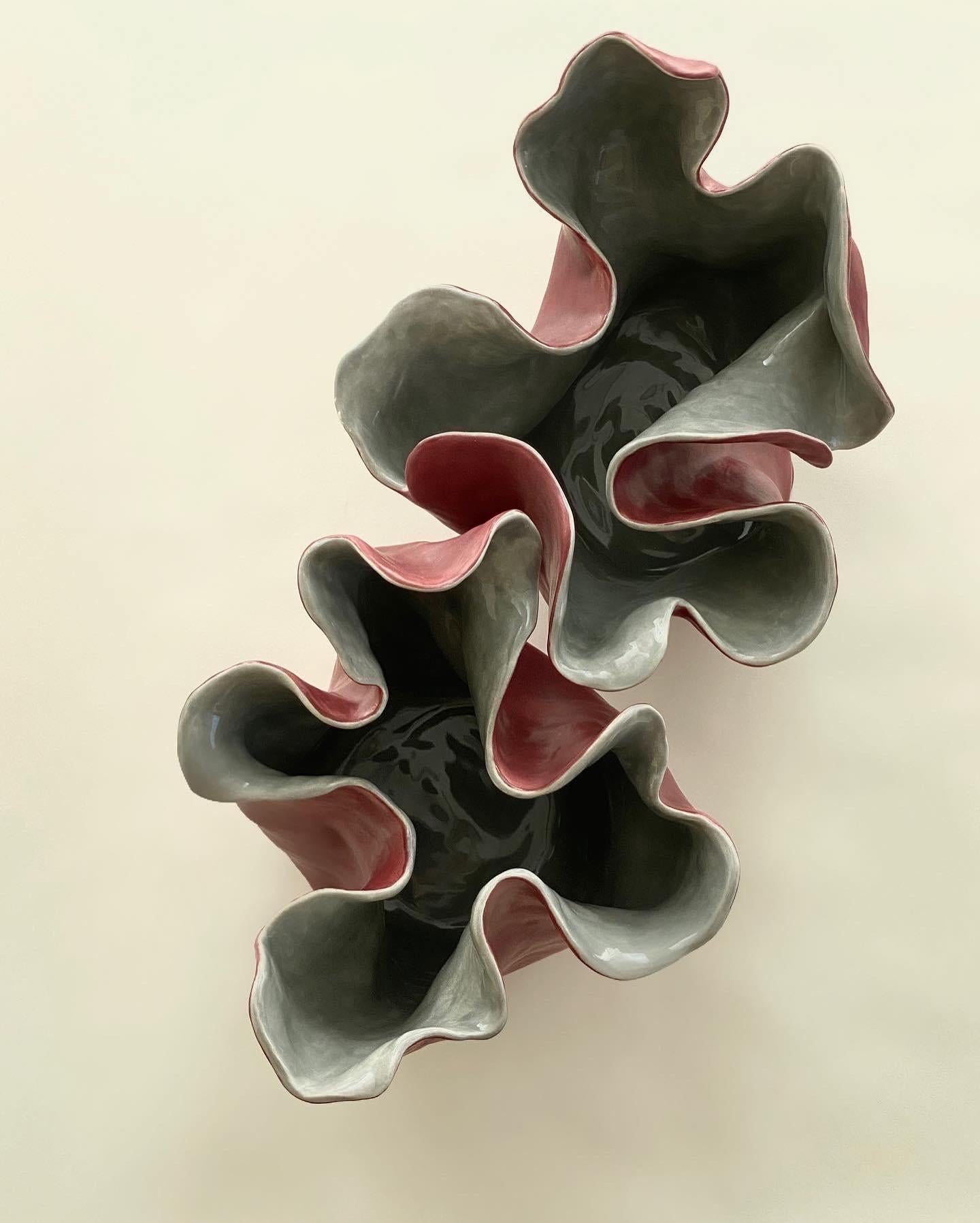 Visceral I, Red and grey, 2020 by Magda von Hanau
From The Visceral Series
Clay Sculpture with Glass Glaze
Dimensions: 12 H x 33 DM in. 

The Visceral series delves into the intricate relationship between the mind and the body, specifically focusing