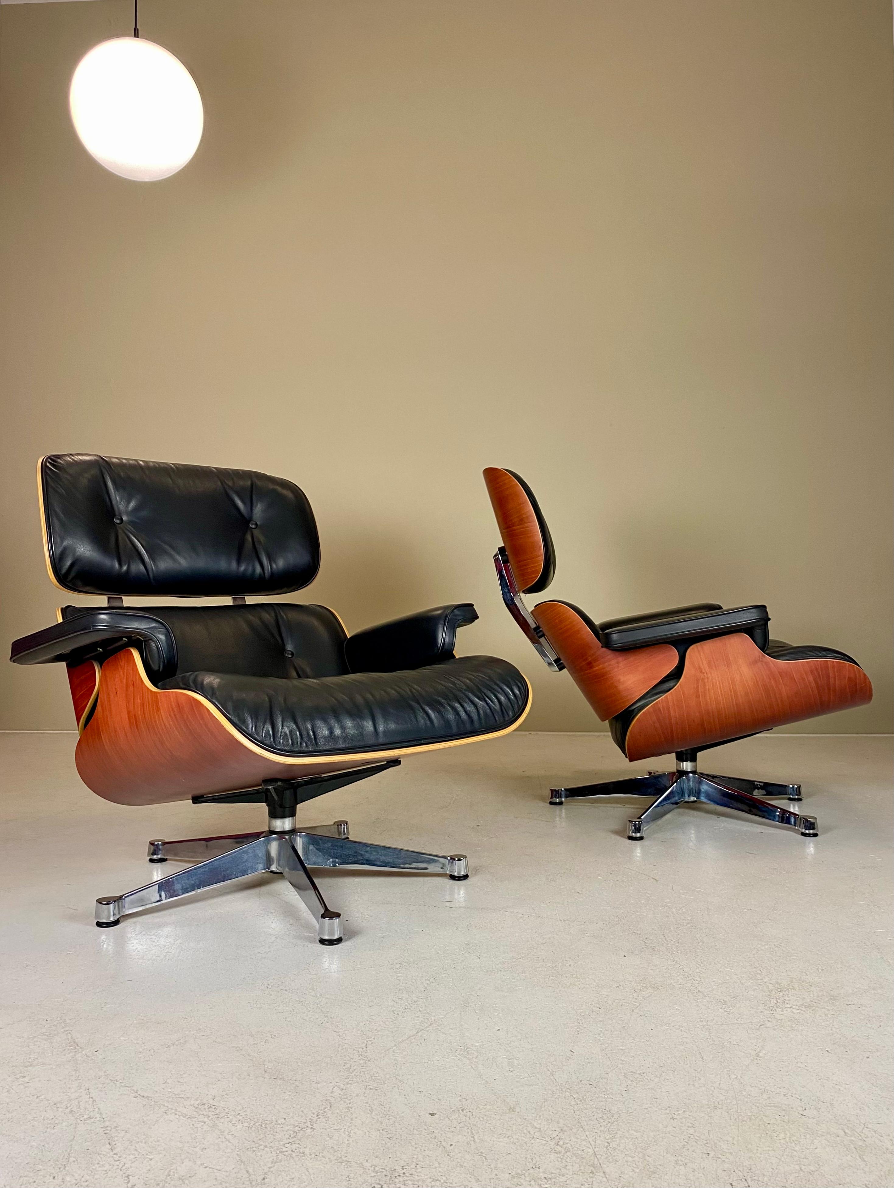 For sale is a lovely set of two iconic Vitra 671 Lounge Chairs, designed by Charles and Ray Eames in 1956. The Eames’ wanted to create a spacious armchair that combines ergonomics — the chair should fit like a baseball glove — with high-quality