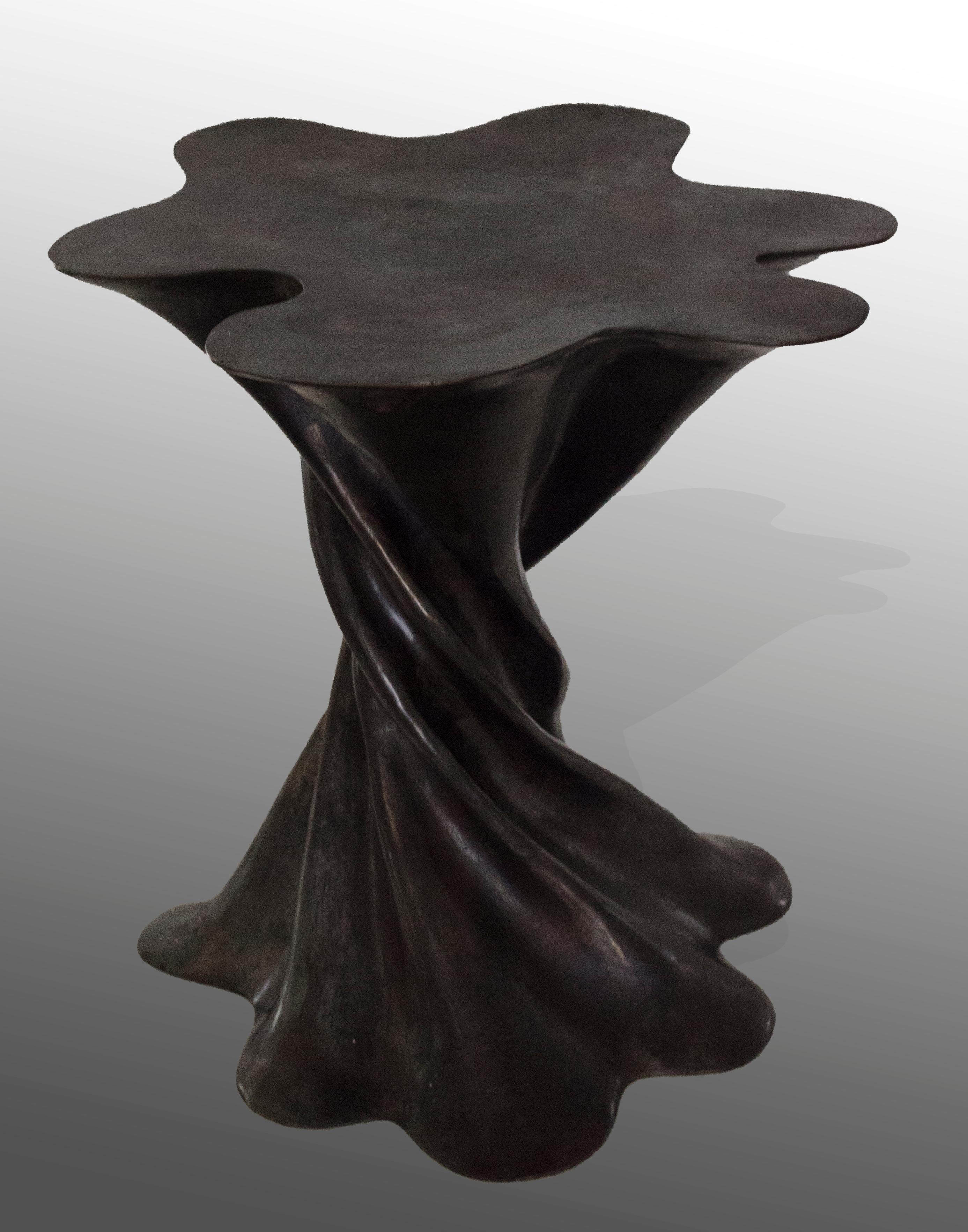 With her love of fabrics and her interest how they work in motion, Stephanie Odegard deisgned this table using the pleats in a dancer's skirt as an inspiration for the Waltz side table. Available in 9 different patinas over cast brass, this piece is
