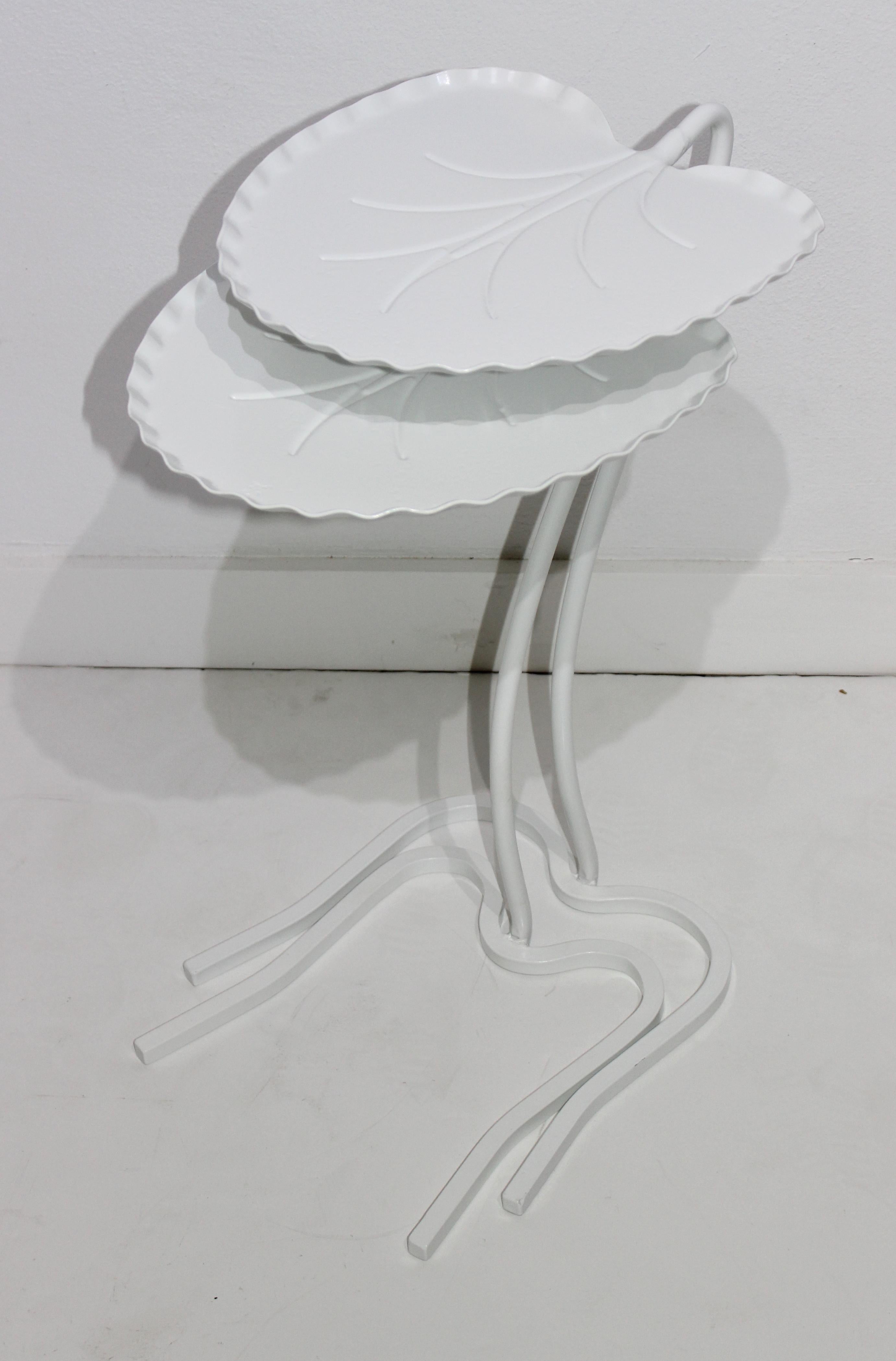 This stylish and iconic set of Salterini lily pad tables will make a statement around the POOL, or perhaps you garden room.

Note: These pieces have been professionally powdercoated in the color Palm Beach White as of 09/15/2020.

Note: