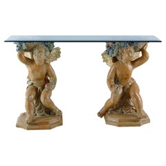 Set of Two Winged Cherubs and Fruit Sculptures