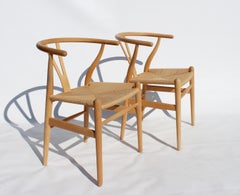Set of Two Wishbone Chairs, Model CH24, of Beech Hans J. Wegner