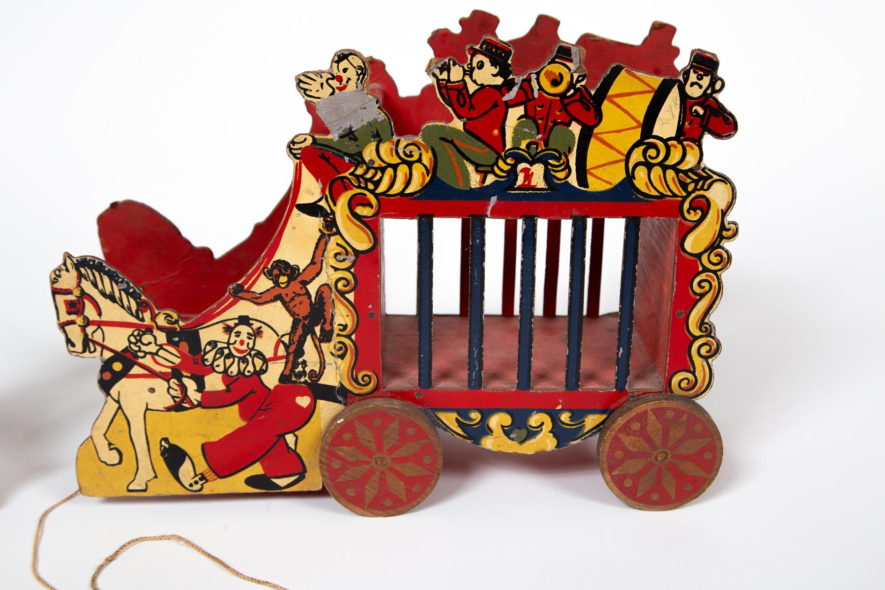 Set von zwei Vintage-Pump-Spielzeugen aus Holz, 20. Jahrhundert (Gemalt) im Angebot