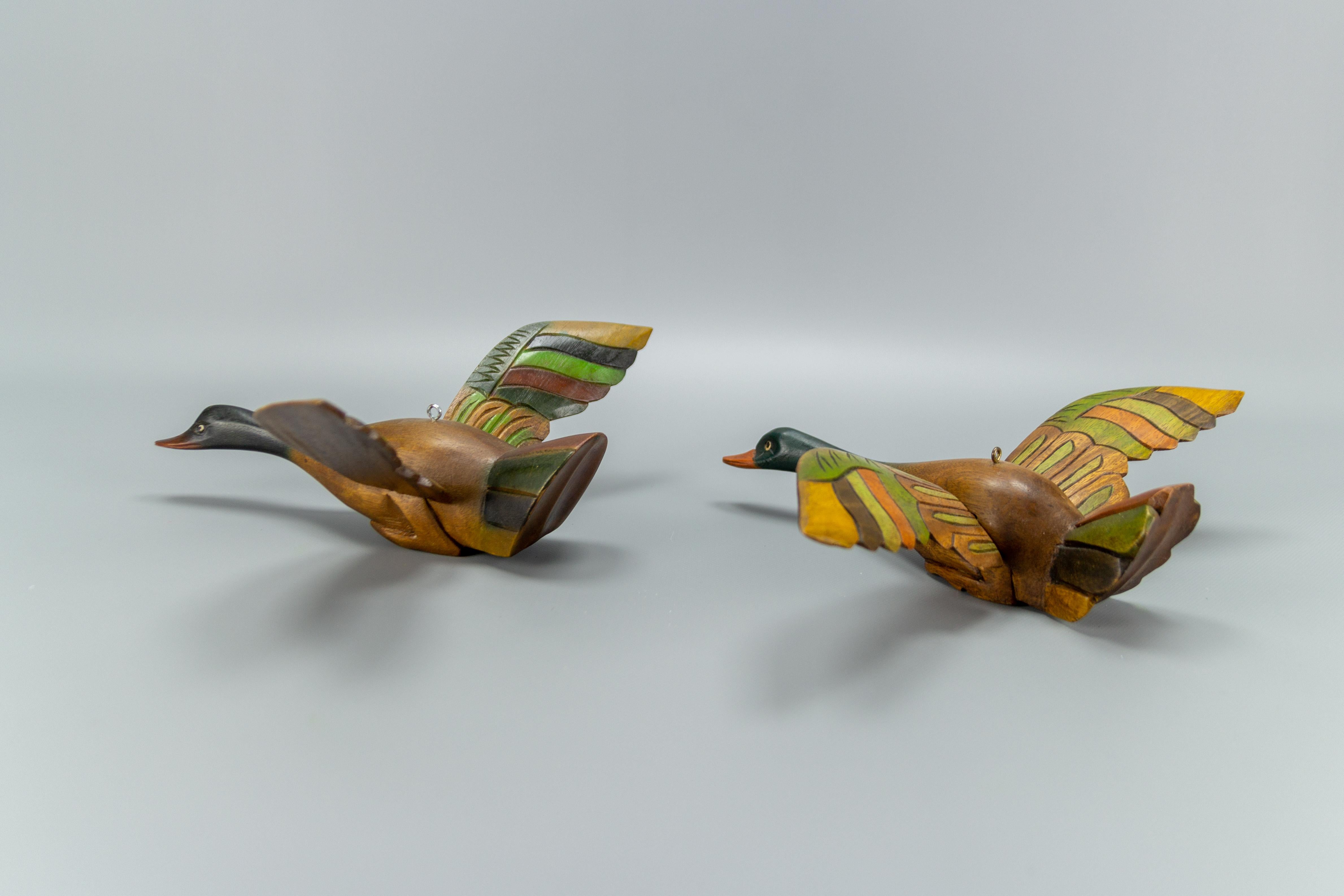 French Set of Two Wooden Carved Flying Duck Hanging Figures