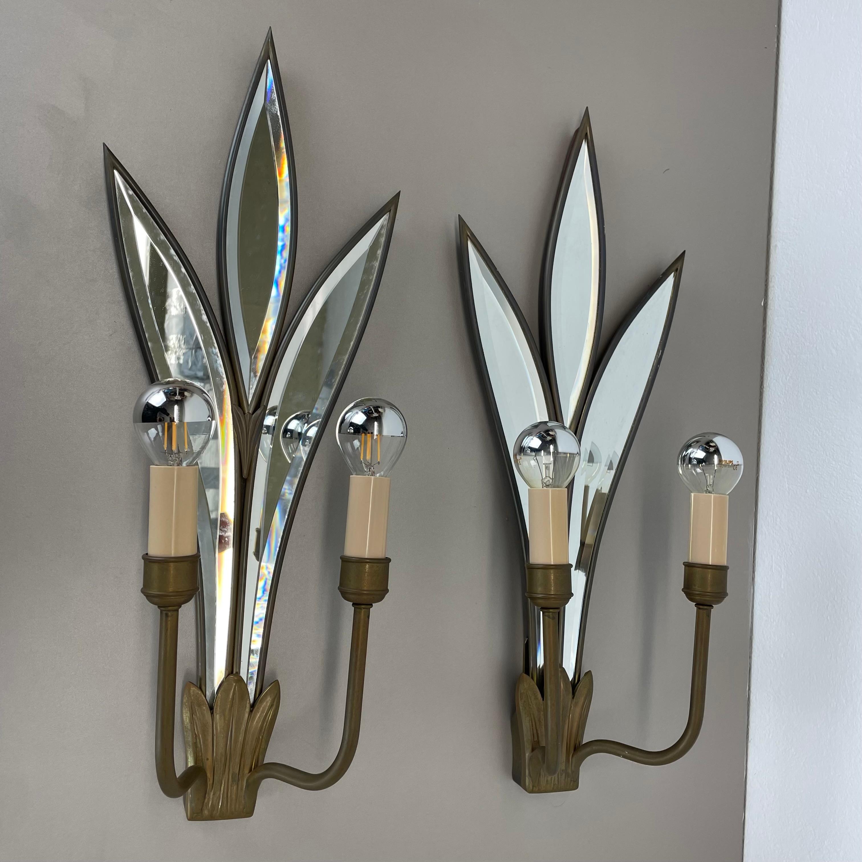 Article:

xxl Bronze wall light, set of 2


Producer:

Origin France


Age:

1970s



This modernist wall light set  was produced in France in the 1970s. It is made from solid bronze and floral formed backside wall application with mirrored glass.