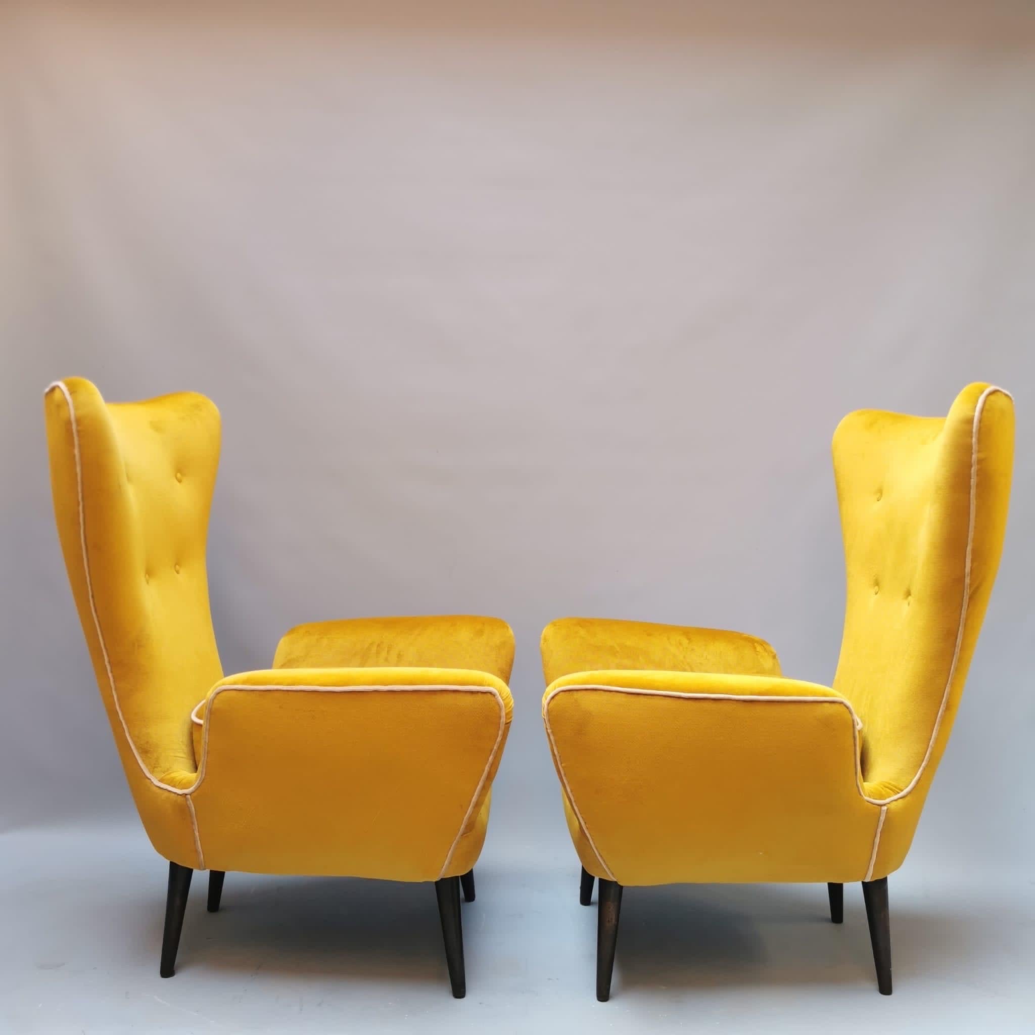 The pair of armchairs is a design by Emilio Sala and Giorgio Maldini for Fratelli Galimberti. The armchairs have been restored and reupholstered by our Italian craftsmen, using quality materials.