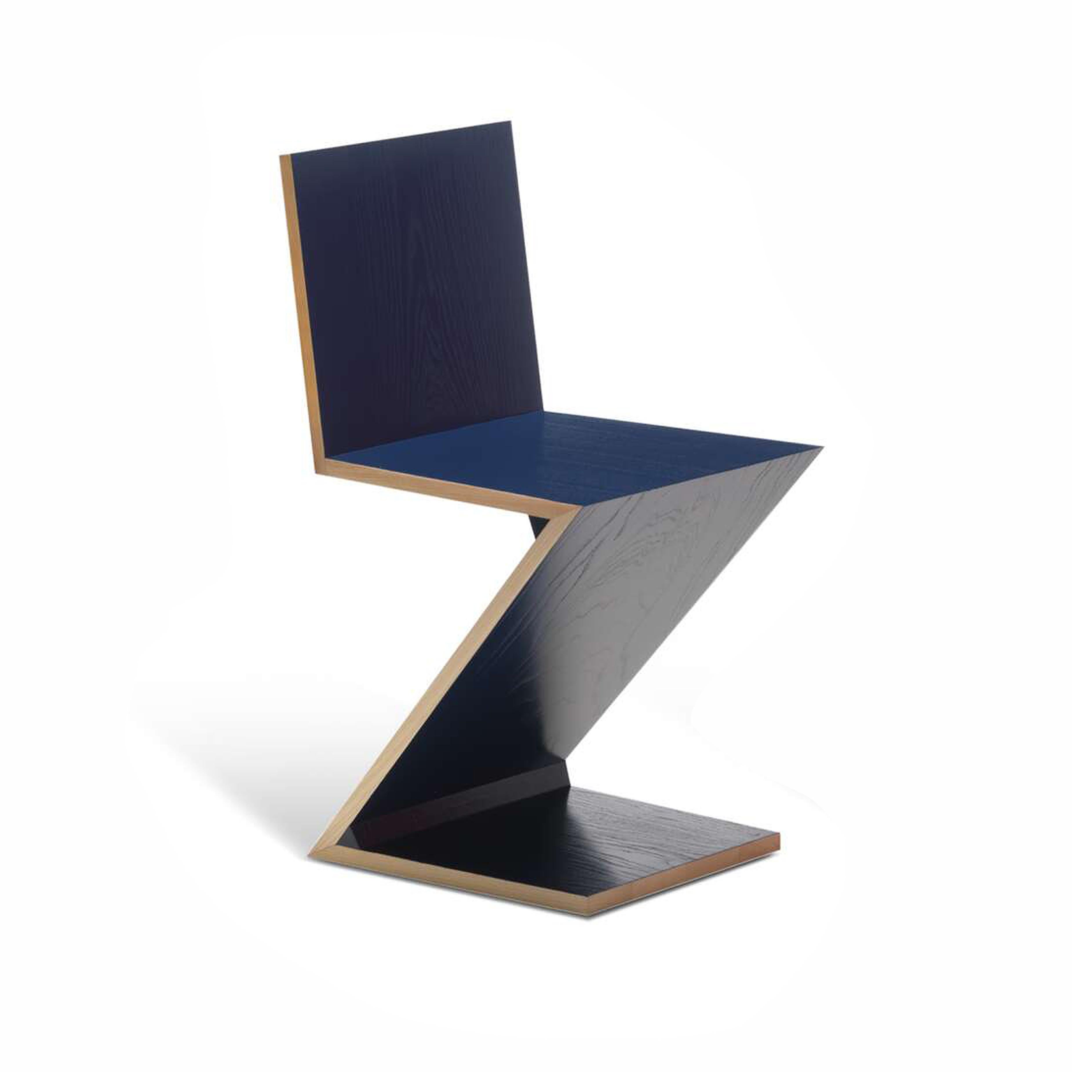 Chairs designed by Gerrit Thomas Rietveld in 1934. Relaunched in 1973/ 2011.
Manufactured by Cassina in Italy.

Designed by Gerrit Rietveld, this chair provided an early example of a cantilevered seat, and is composed of four wood boards