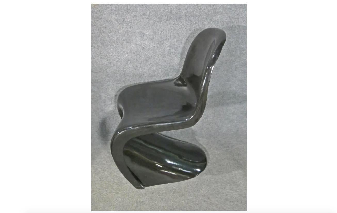 With a futuristic molded plastic design, this vintage design features a glass-topped table with a curving base and a pair of chairs. Chair dimensions: W 19 x D 25 x H 33 SH 17
Please confirm item location with seller (NY/NJ).