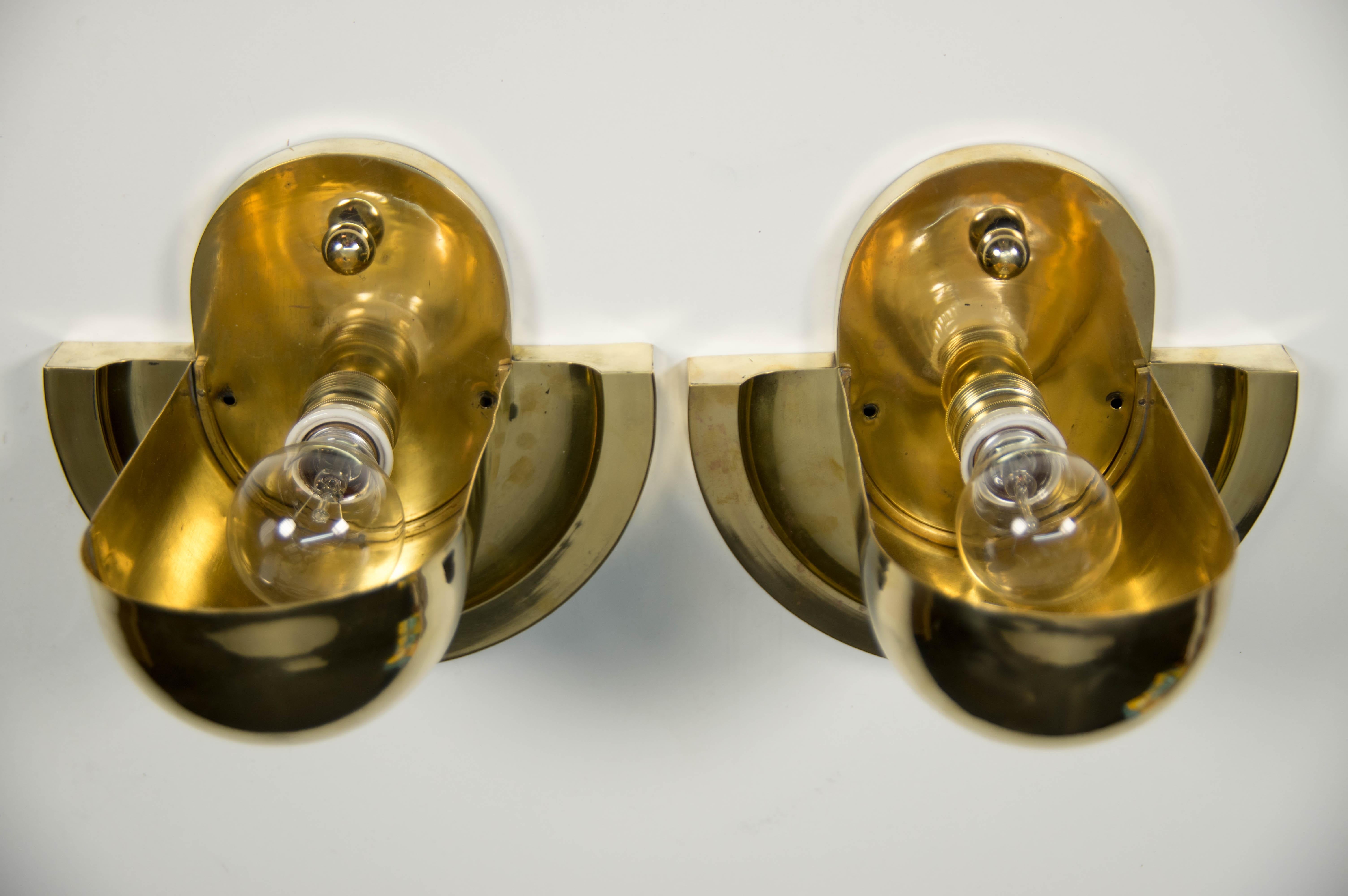 Very rare brass wall lamps come from house in cubistic style. Beautiful clean and simple rondocubist lines. Attributed to Josef Gocár, Polished, rewired. Original brass and ceramic sockets: E25-E27. US wiring compatible.