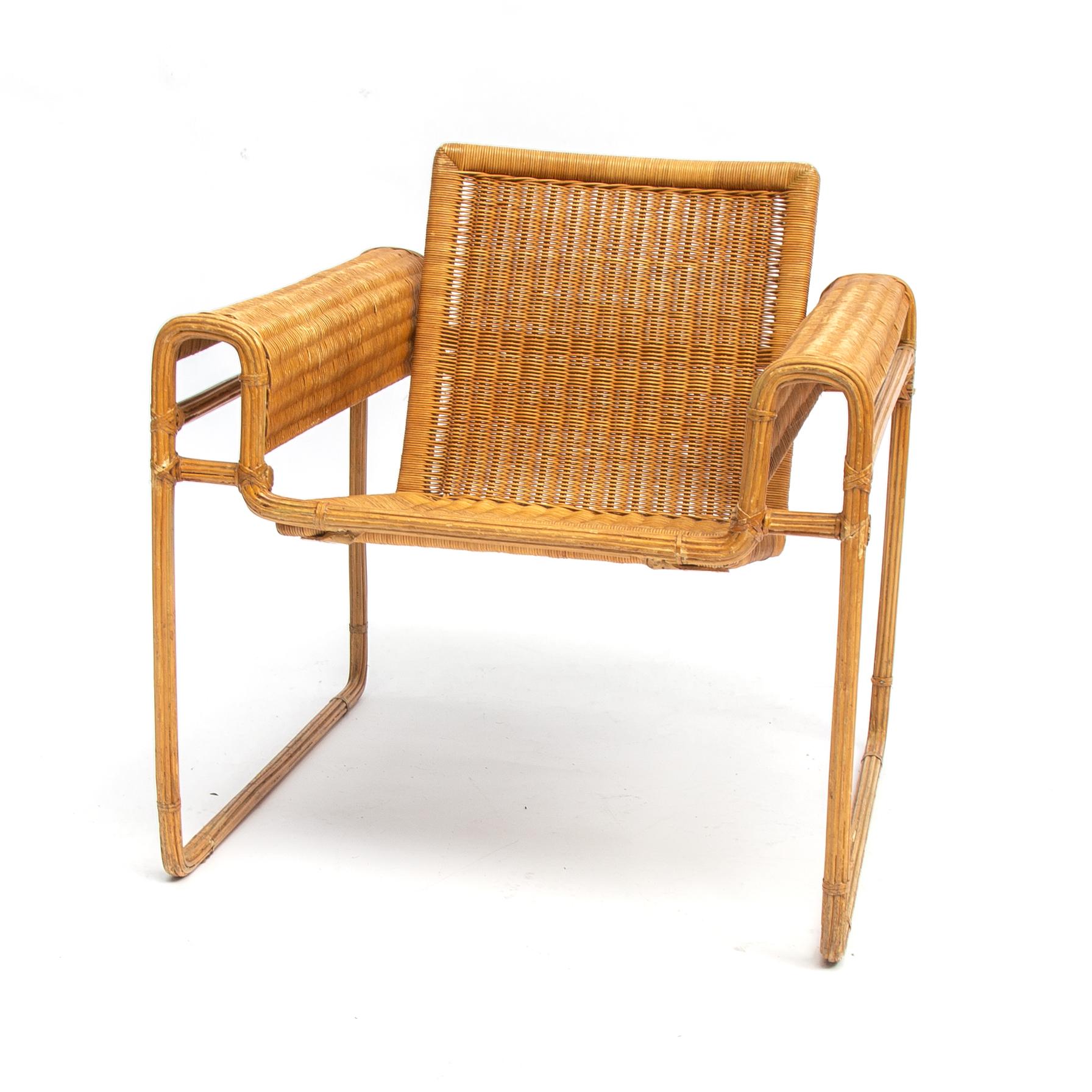 Rare and absolute unique translation of the original Wassily chair by Marcel Breuer, The metal frame owns covered with strips if lacquered bamboo, seating and beck are handmade wicker.

The Wassily chair, inspired by the frame of a bicycle and