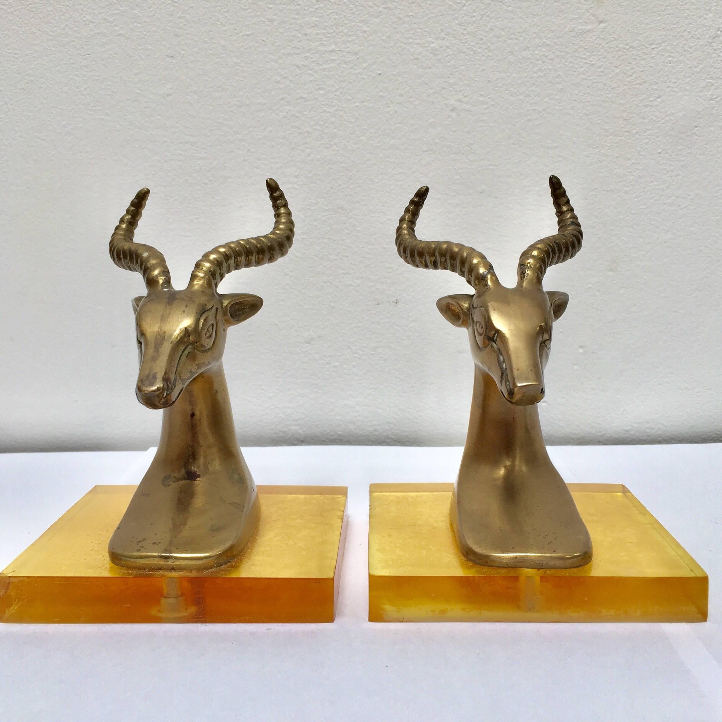 Set of vintage brass antelope on Lucite stand bookends.
Size for each: 5.5