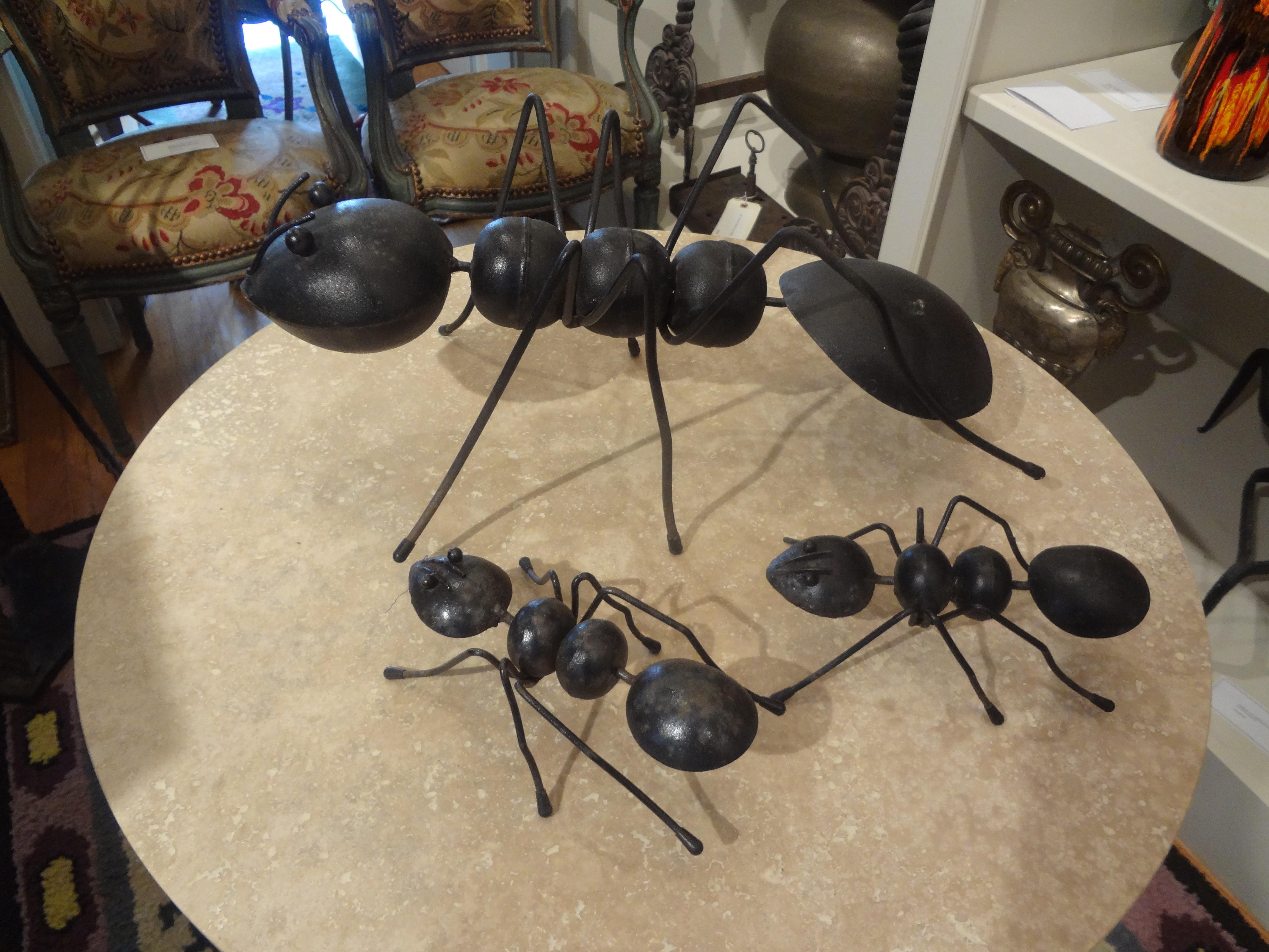 Set of vintage Brutalist decorative iron ants. This whimsical group of three iron ants make great accessories for a coffee table, console table, commode or credenza. Interesting and unusual!
Measures: Large ant:
6.13 inches H
15.75 inches L
8.25