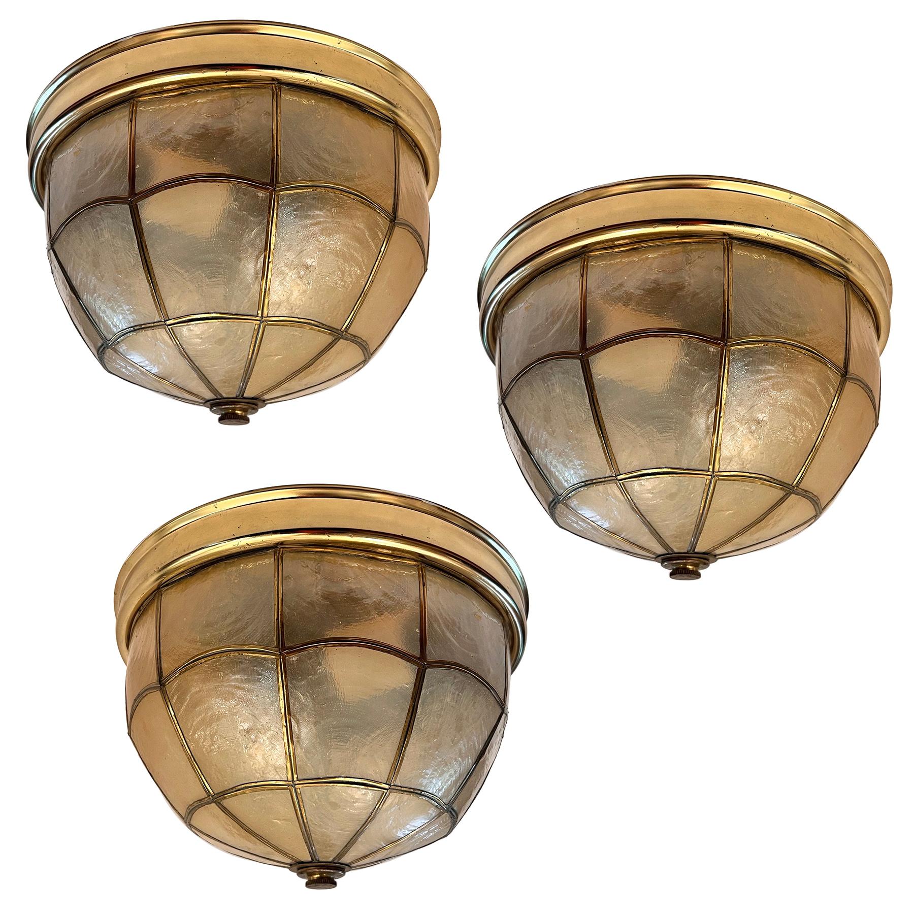 A set of three circa 1940's French capiz fixtures. Sold individually.

Measurements:
Height: 5.75