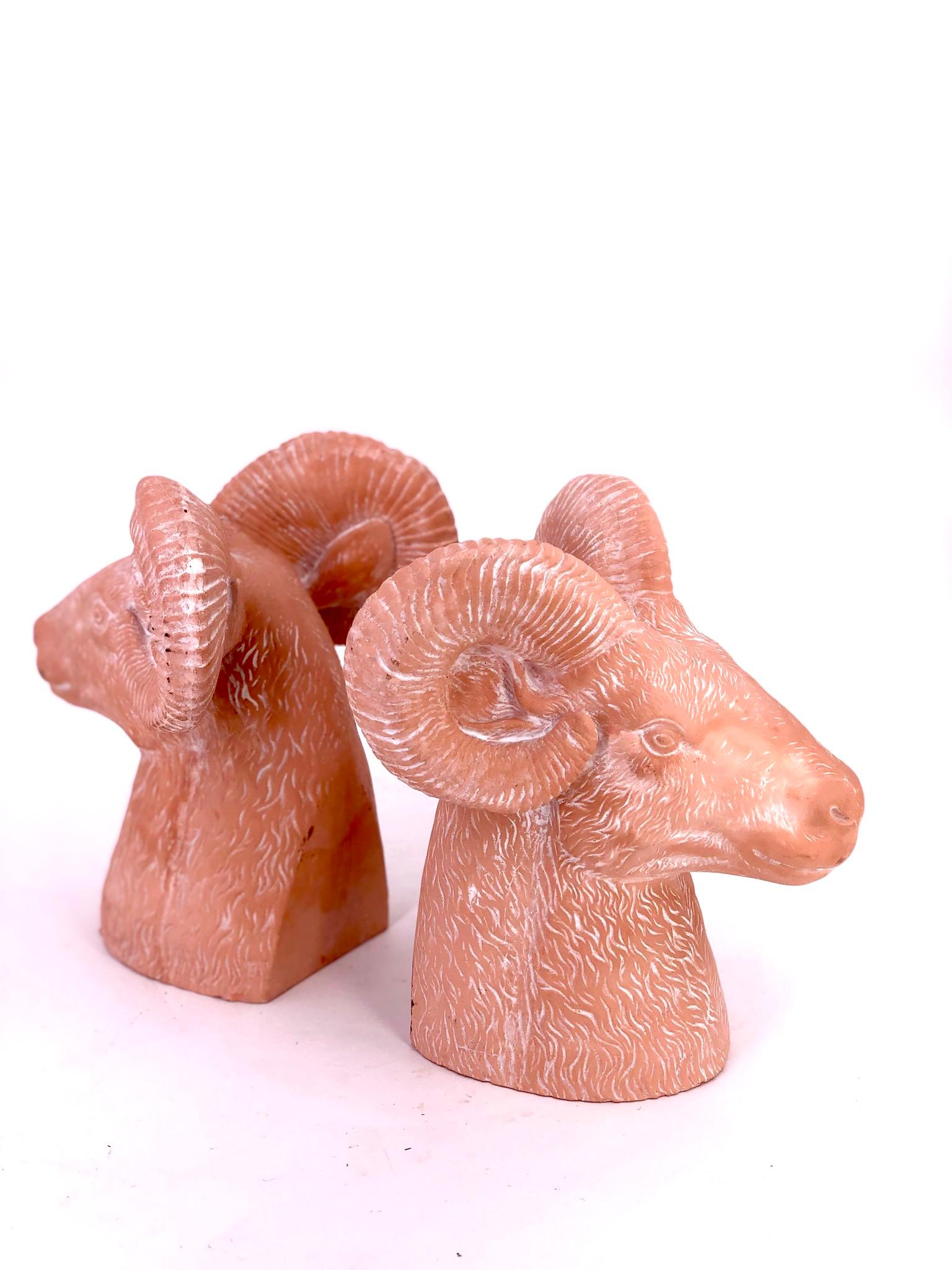 Great pair of collectible bookends rams heads, circa 1970s nice lite pink mate finish with whitewash, no chips or cracks.