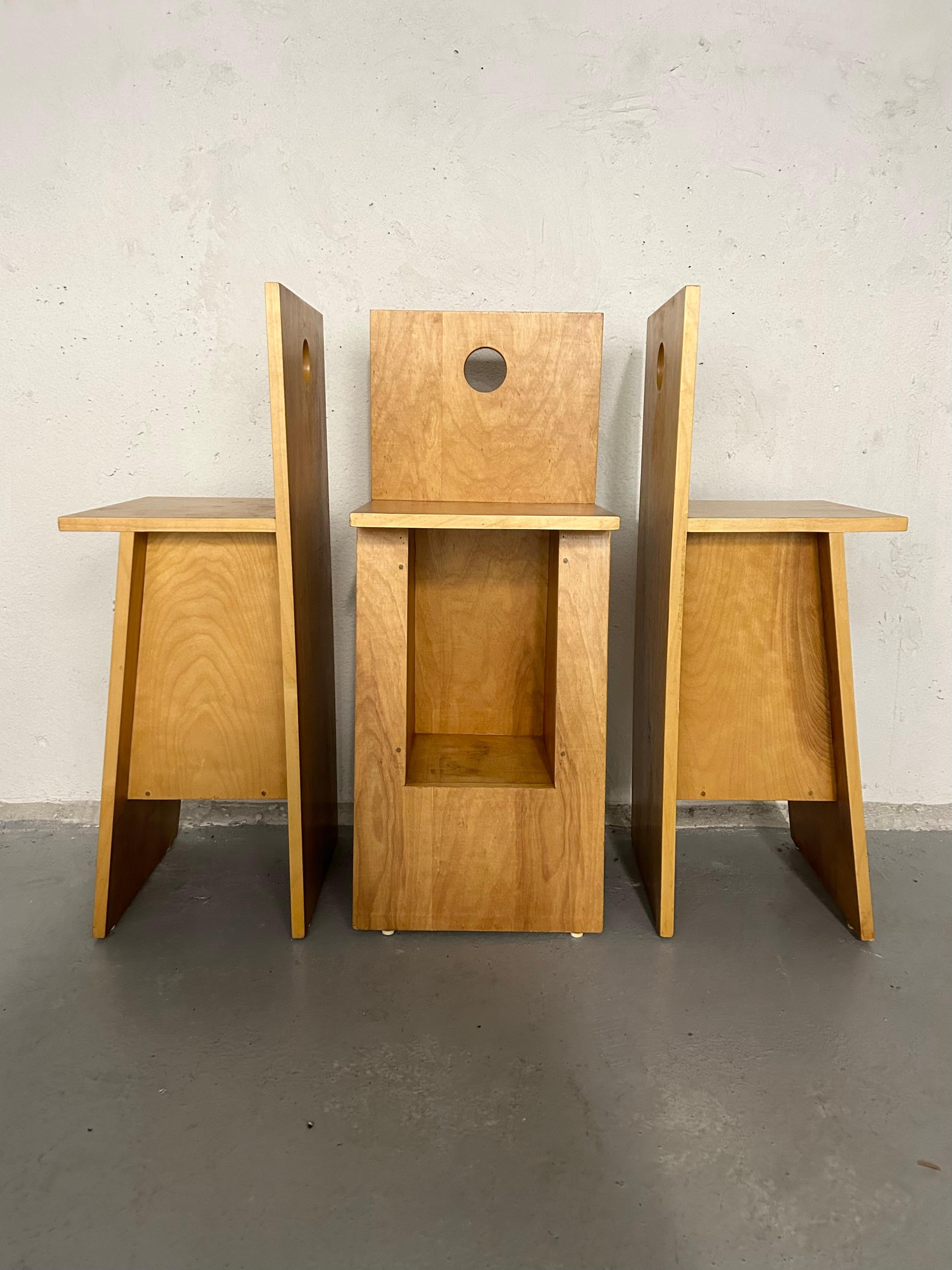 Vintage cherry wood counter stools in the style of Donald Judd. Minimal wear. Set of 3. One stool has tiny scratch on the back side of the chair - shown in last photo. 