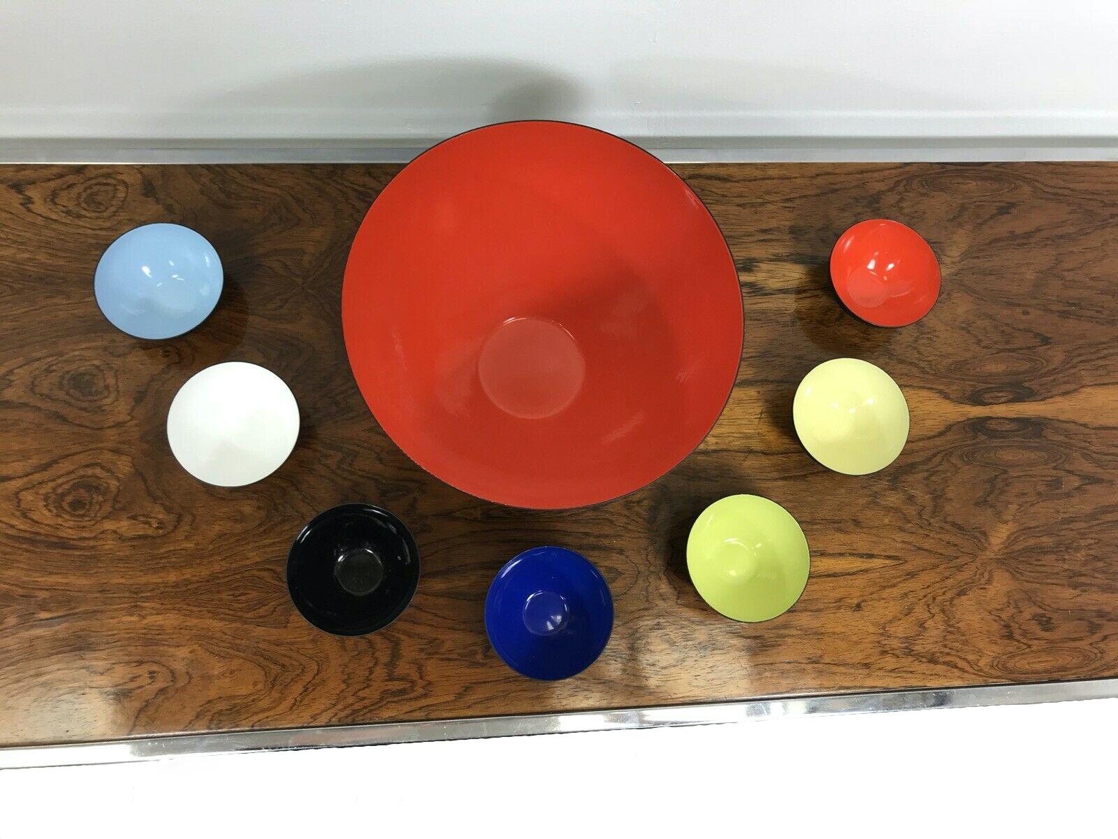 Rare set of vintage Danish Krenit Bowls designed by Normann Copenhagen. Era 1960s.

Consisting of a black metal exterior and a bright colorful enamel interior

The Colors are reflective of the artists Mondrian and Miro hugely influential artists