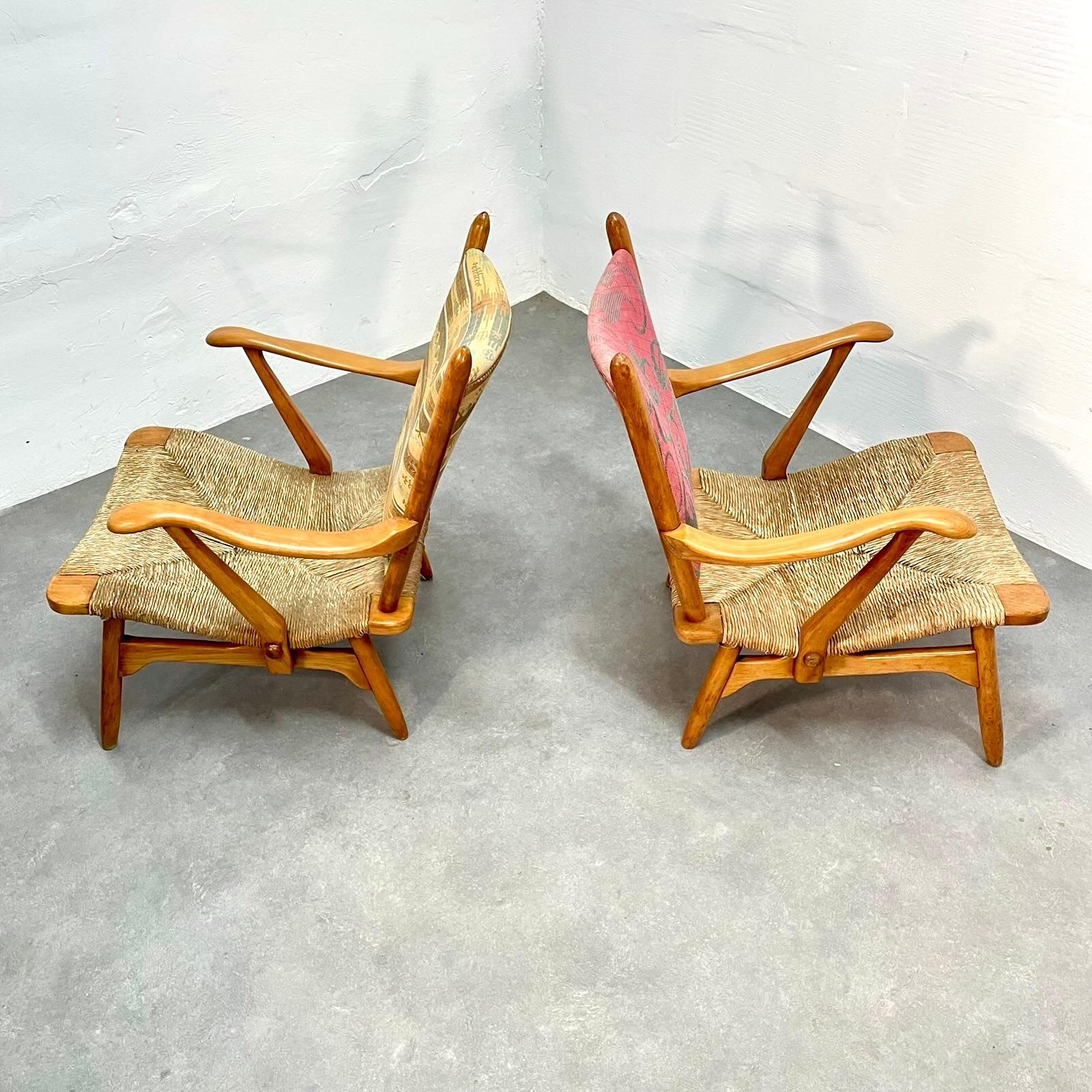 Beautiful set of armchairs by De Ster Gelderland, a classic piece from 1950s. 
The uniquely shaped frame is made out of cherry wood which adds a distinctive character to this set. 
The set is in its original condition, with original upholstery which