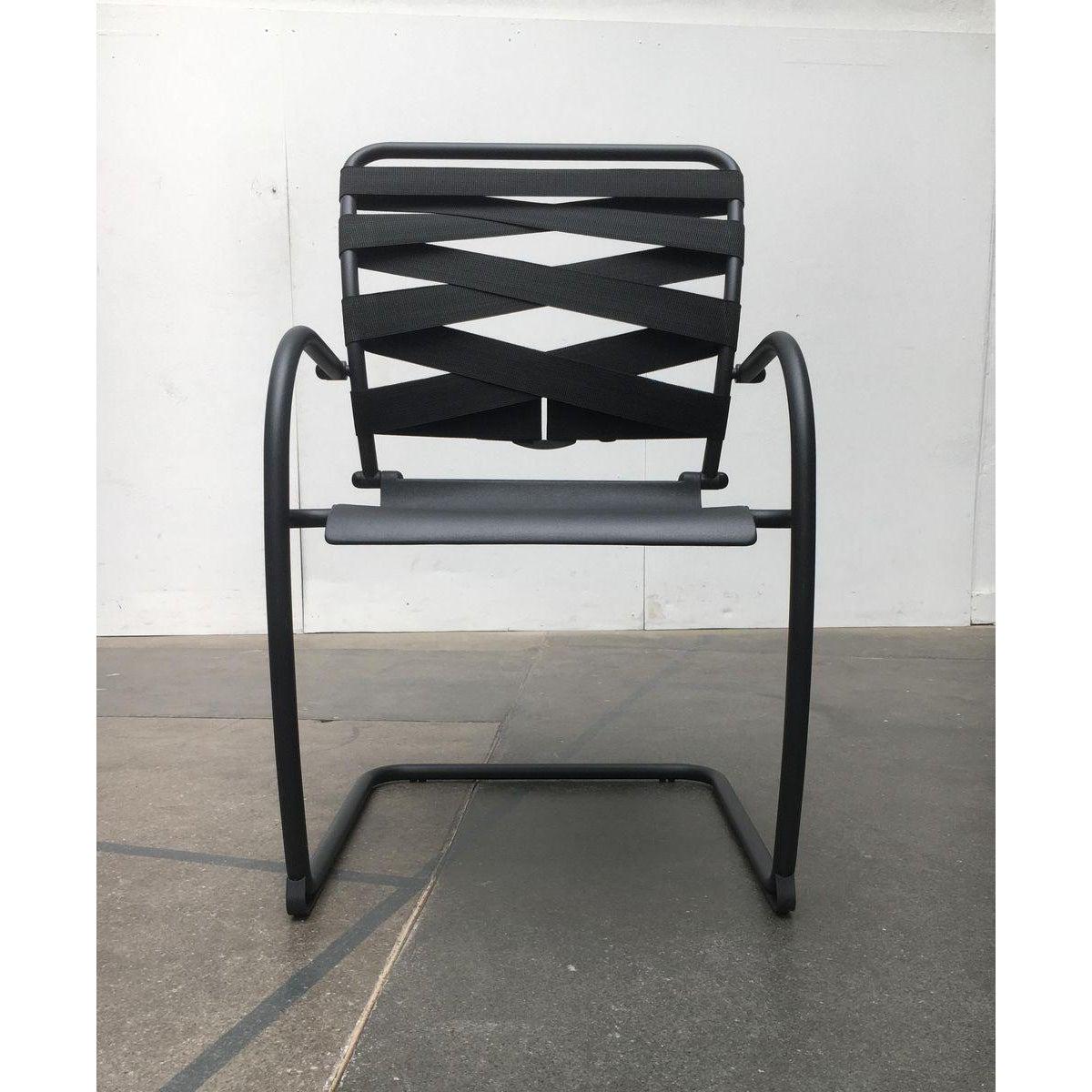 Rare cantilever chairs from Italy based on a design by Heron Parigi from the late 80s.

A postmodern design in the formal language of the 80s and early 90s. The seat is made of a solid aluminum casting. The armrests and the rest of the frame are