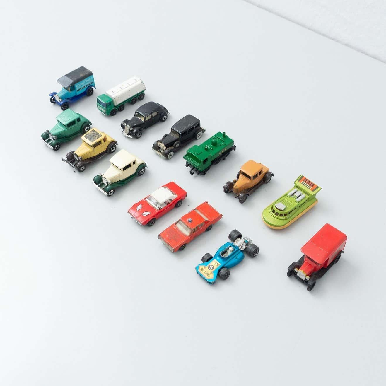 Set of fourteen vintage matchbox toy cars.
By Unknown manufacturer, circa 1960.

In original condition, with minor wear consistent with age and use, preserving a beautiful patina.

Materials:
Metal
Plastic

Dimensions (each one):
D 7.5 cm x W 2.5 cm