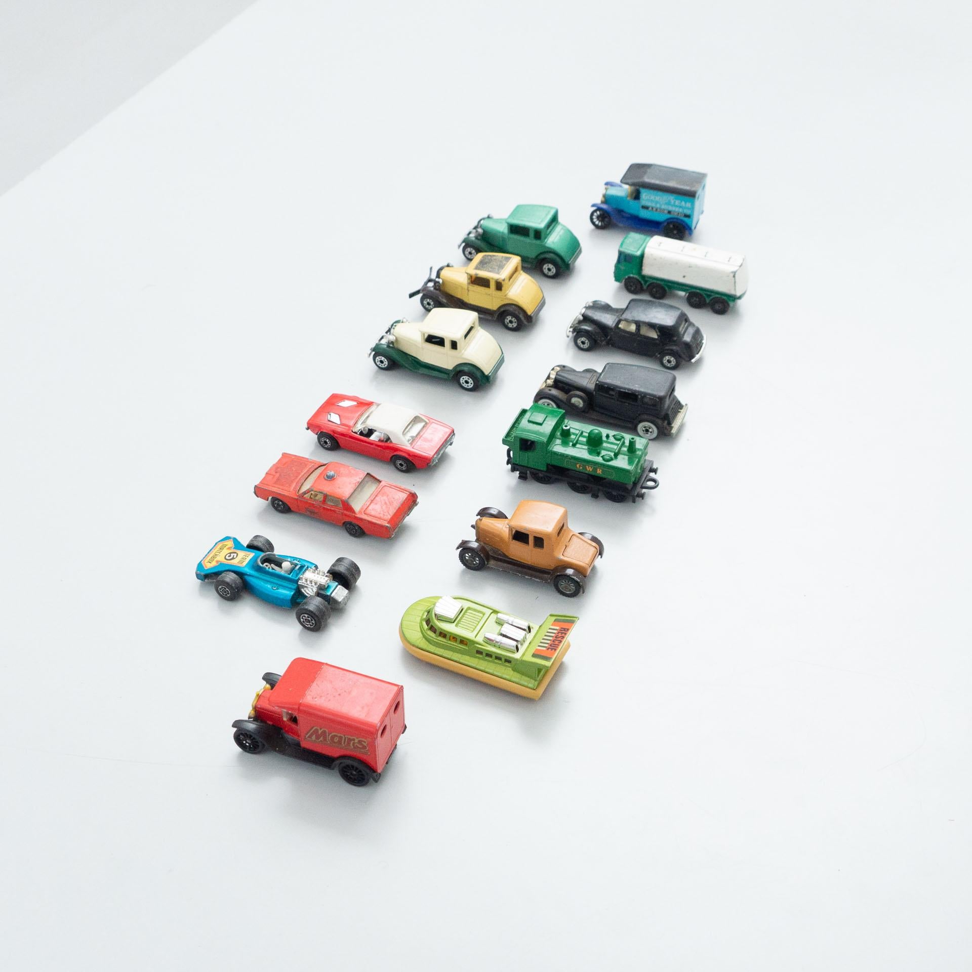 Set of fourteen vintage matchbox toy cars.
By Unknown manufacturer, circa 1960.

In original condition, with minor wear consistent with age and use, preserving a beautiful patina.

Materials:
Metal
Plastic

Dimensions (each one):
D 7.5 cm