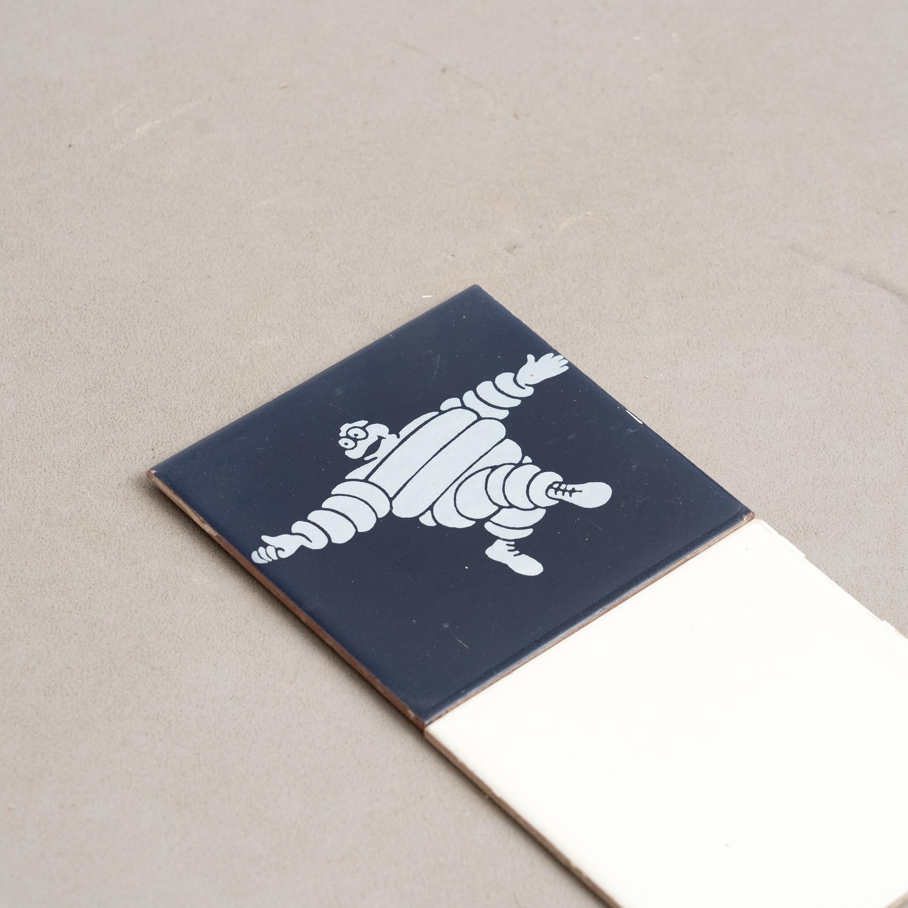 Juego de baldosas vintage Michelin Man, hacia 1960 en venta 2