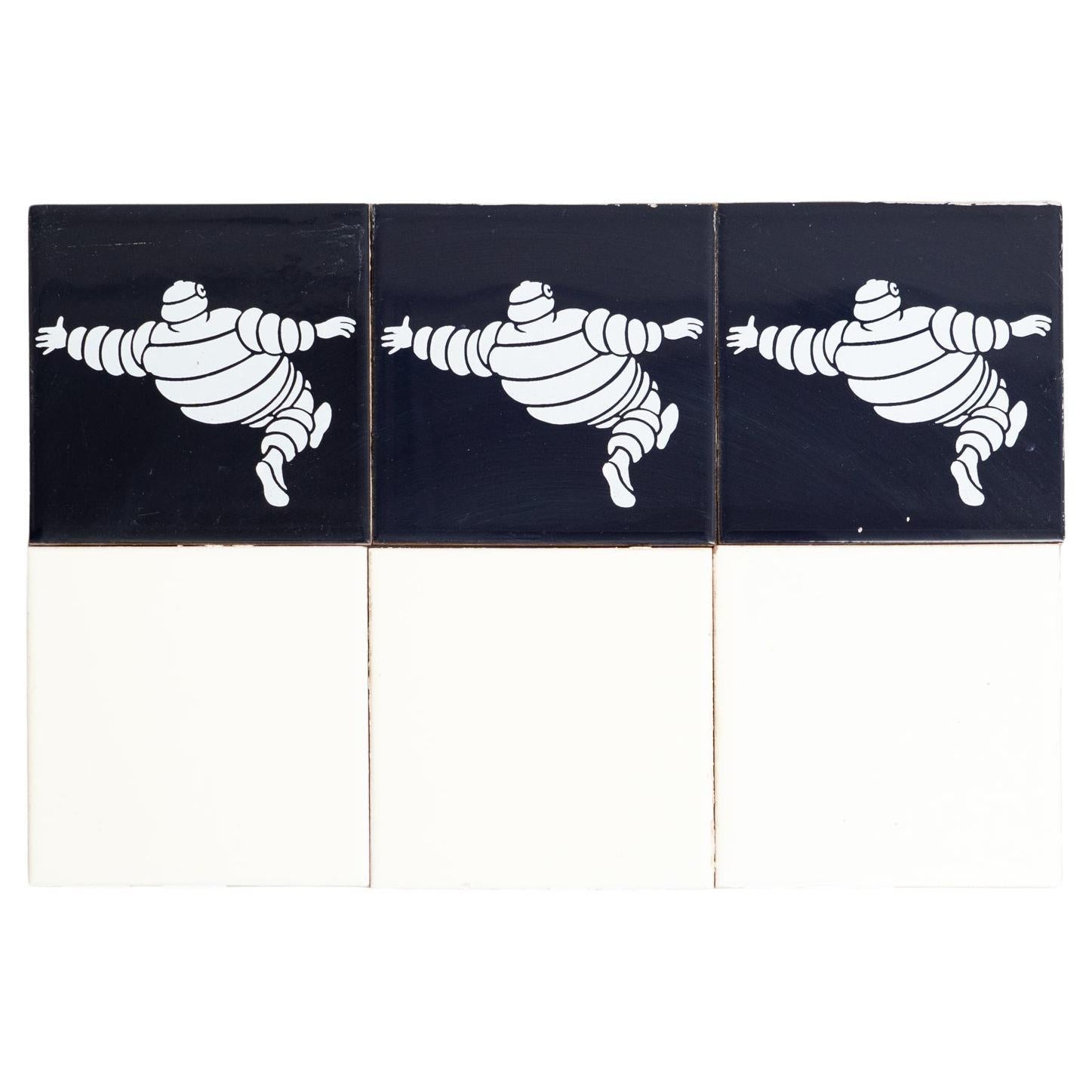 Juego de baldosas vintage Michelin Man, hacia 1960