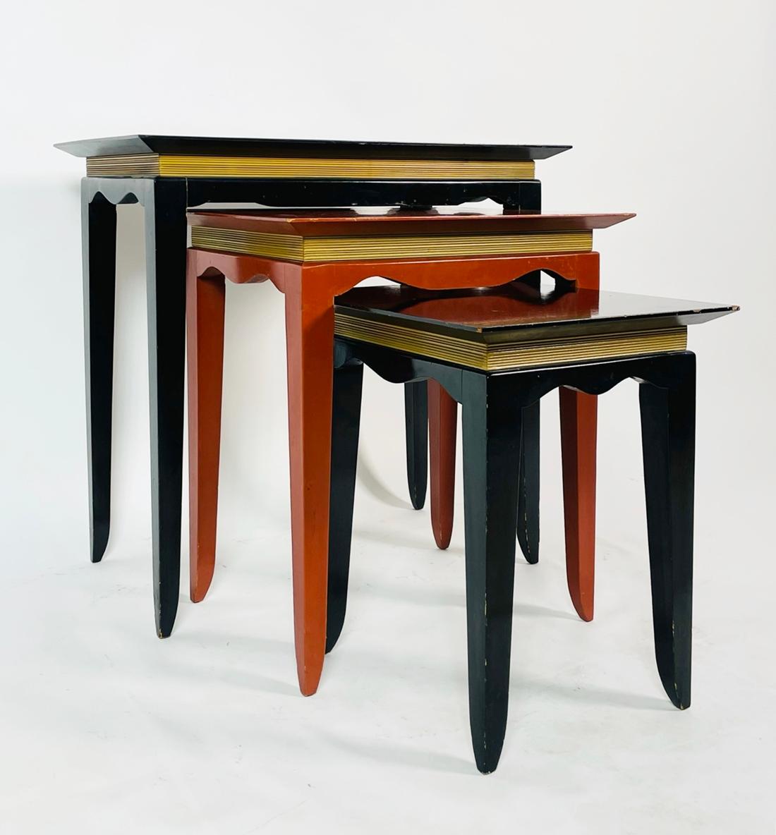 Designer nesting tables custom made in the 1960s.
The tables have beautiful lines and could be used as a set or separate to be used in different areas of a house.

Measurements: 
Large black table:
26 inches wide x 16 inches deep x 25.25 inches