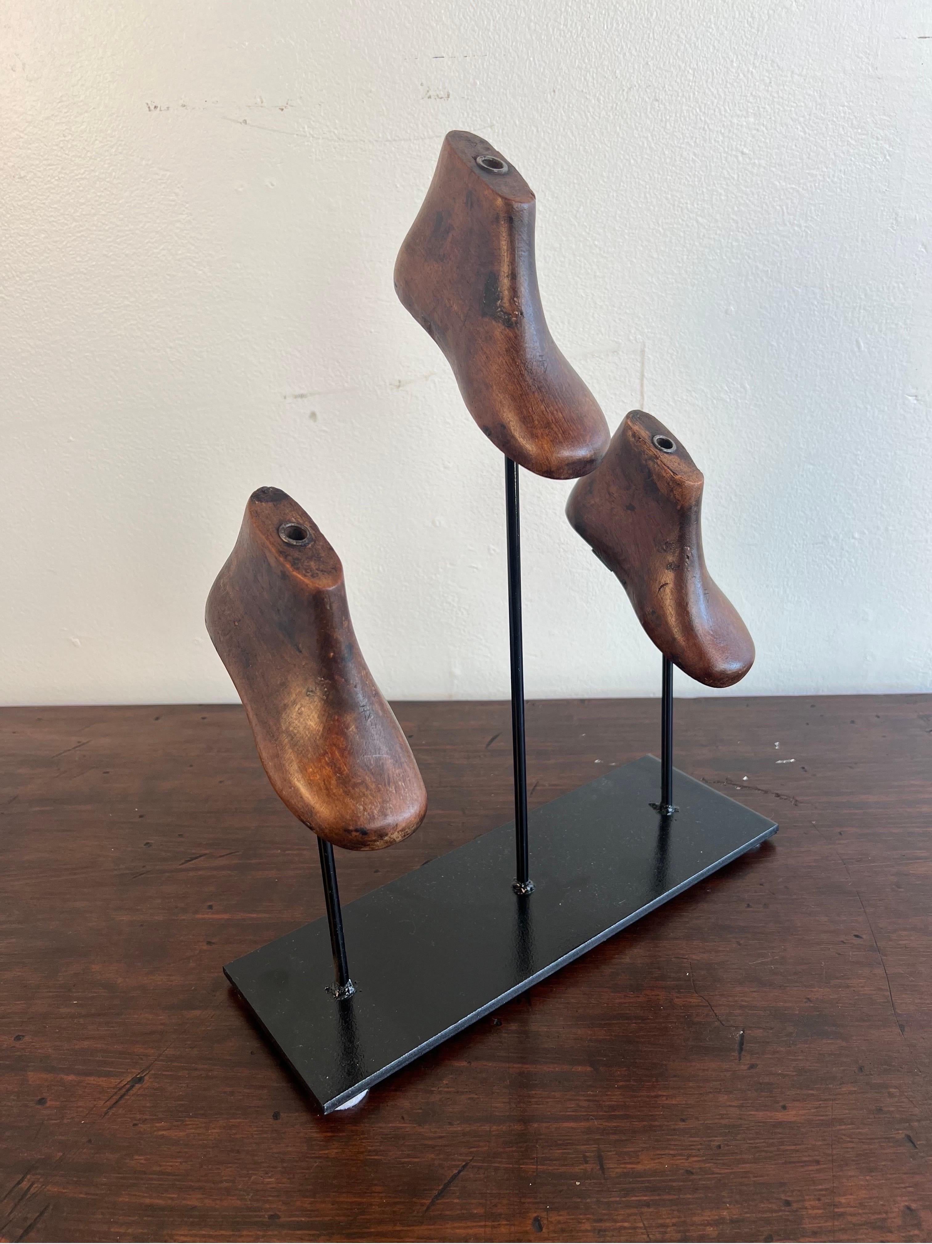Set of Vintage Shoe Forms Mounted on Iron Base In Distressed Condition For Sale In Los Angeles, CA