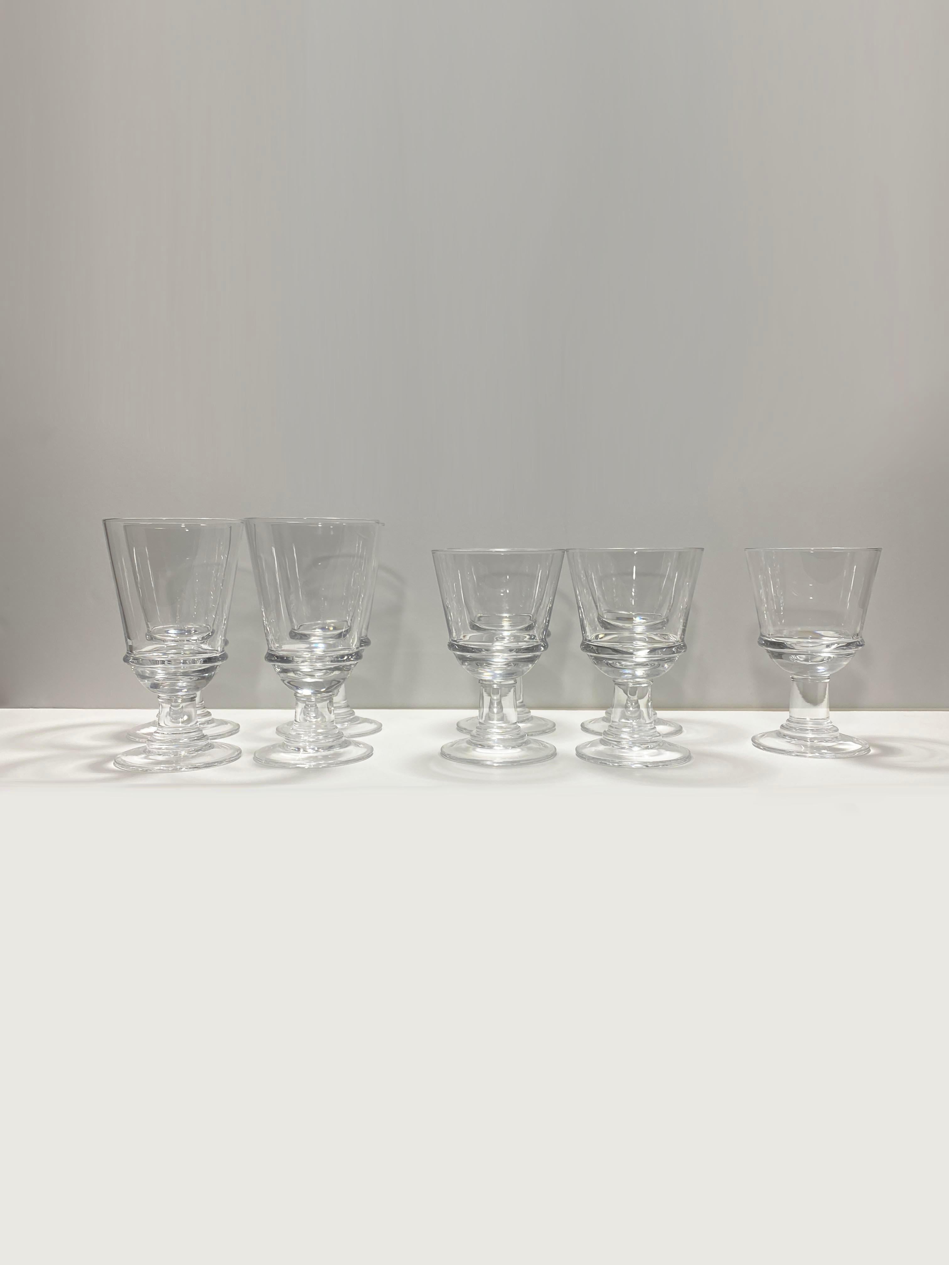 It includes a set of (4) tall goblets & (4) + (1 extra) short goblets. A perfect way to entertain with a story also a great gift for someone special with great taste.  

Tall Goblets:
Height: 7”
Diam: 6