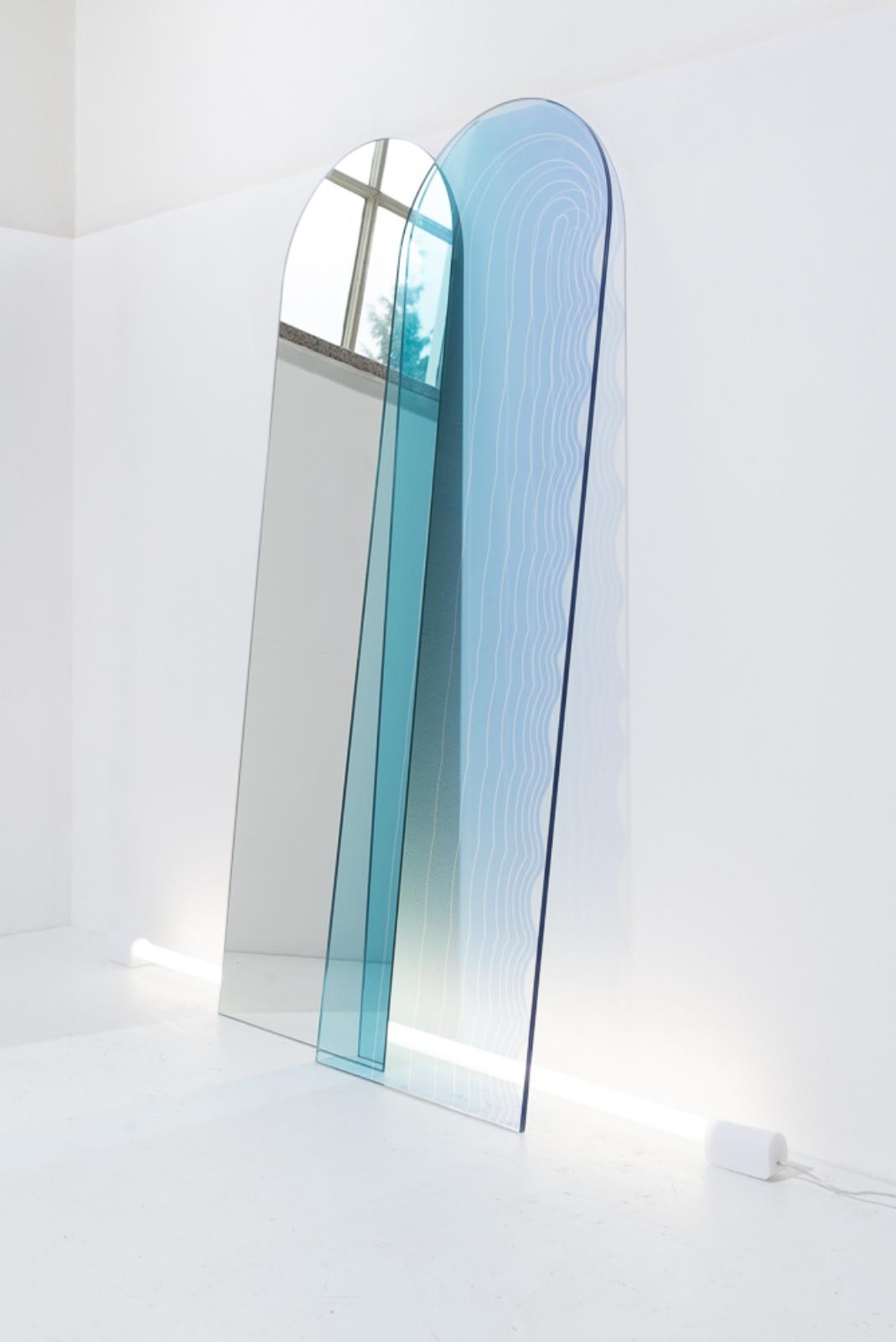 Set of Wave infinity glass panel and mirror by Studio Thier & van Daalen
Dimensions: W 35 x D 1 x H 120 cm
Materials: Laminated and Hardened Glass.
Also Available: Luminous LED Bar for the panels.

Iris has captured her fascination for colour,