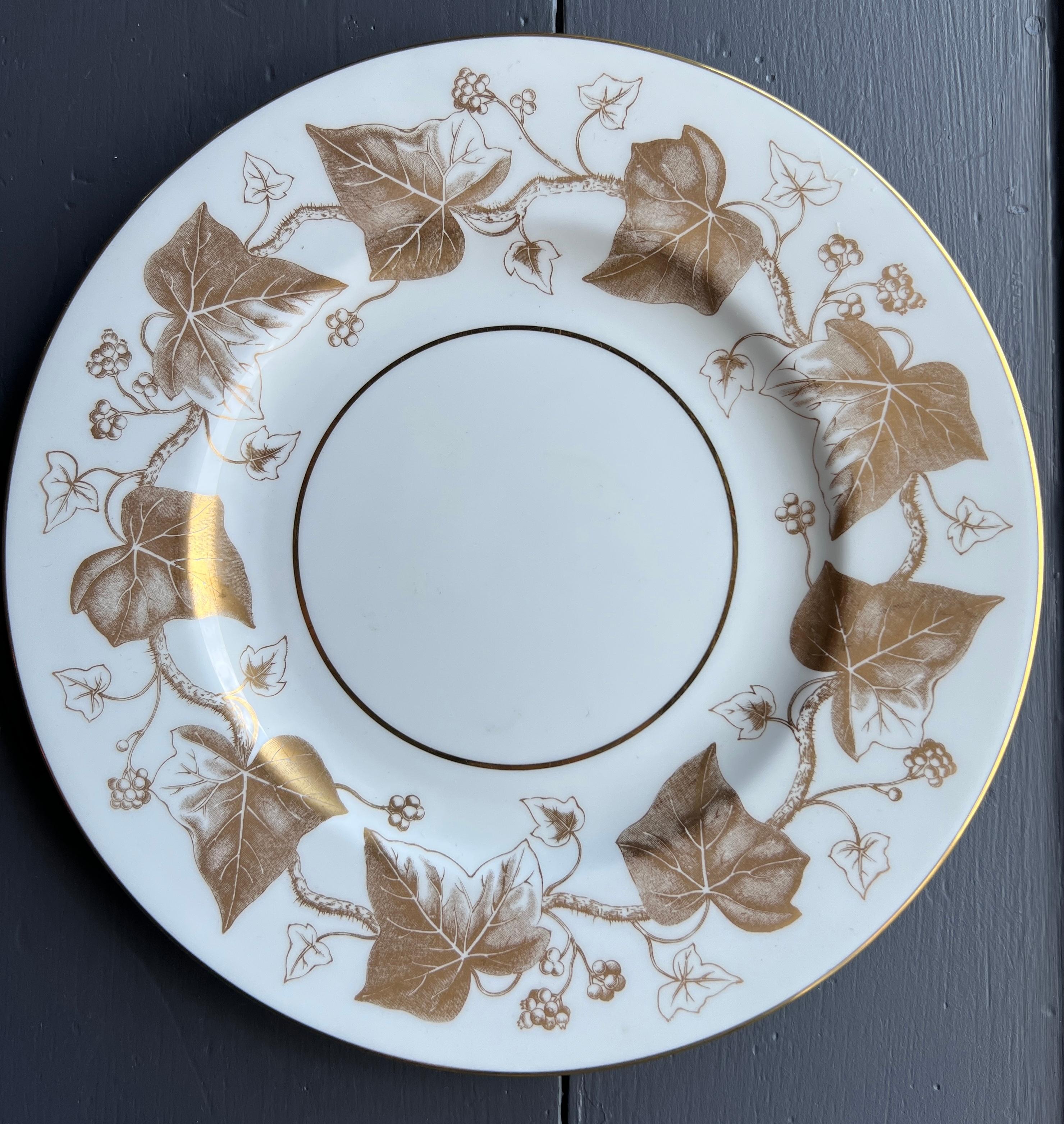 Set of Wedgewood Bone China - Pattern: Gold Leaf Ivy
Set of: 
30 Dinner plates 10 1/2'' diameter 
30 Salad Plates 8'' diameter 
27 Footed Cup & Saucer Set Height: 2 1/4 in  
 30 Bread and Butter Plates 6in
One creamer and two sugar dishes 
Hand wash