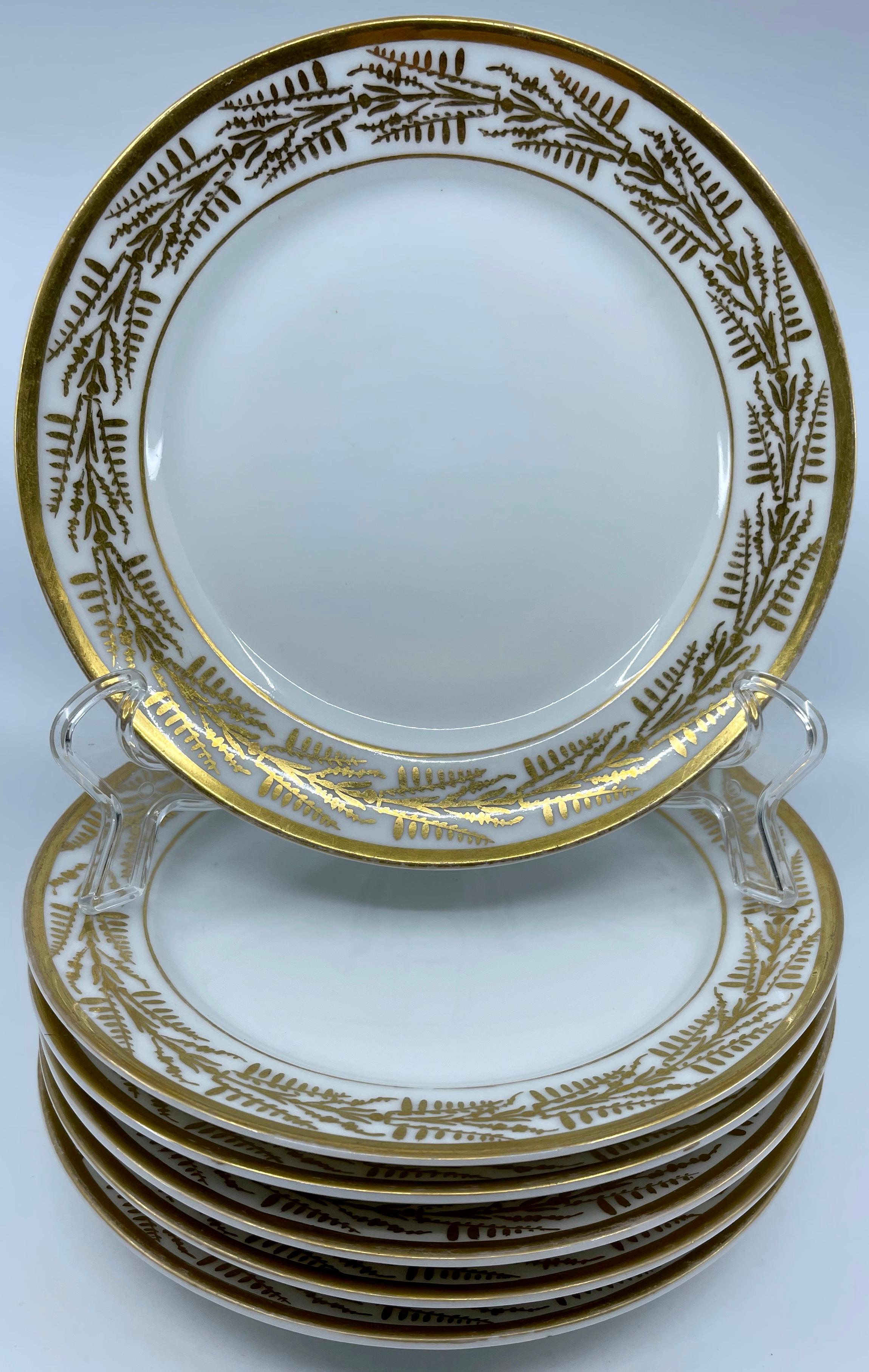 Set of six white and gold empire plates. Six near perfect antique condition Paris Porcelain neoclassical plates with gilt bands bordering stylized foliate band in gleaming gold. France circa 1820’s.
Dimensions: 7.63
