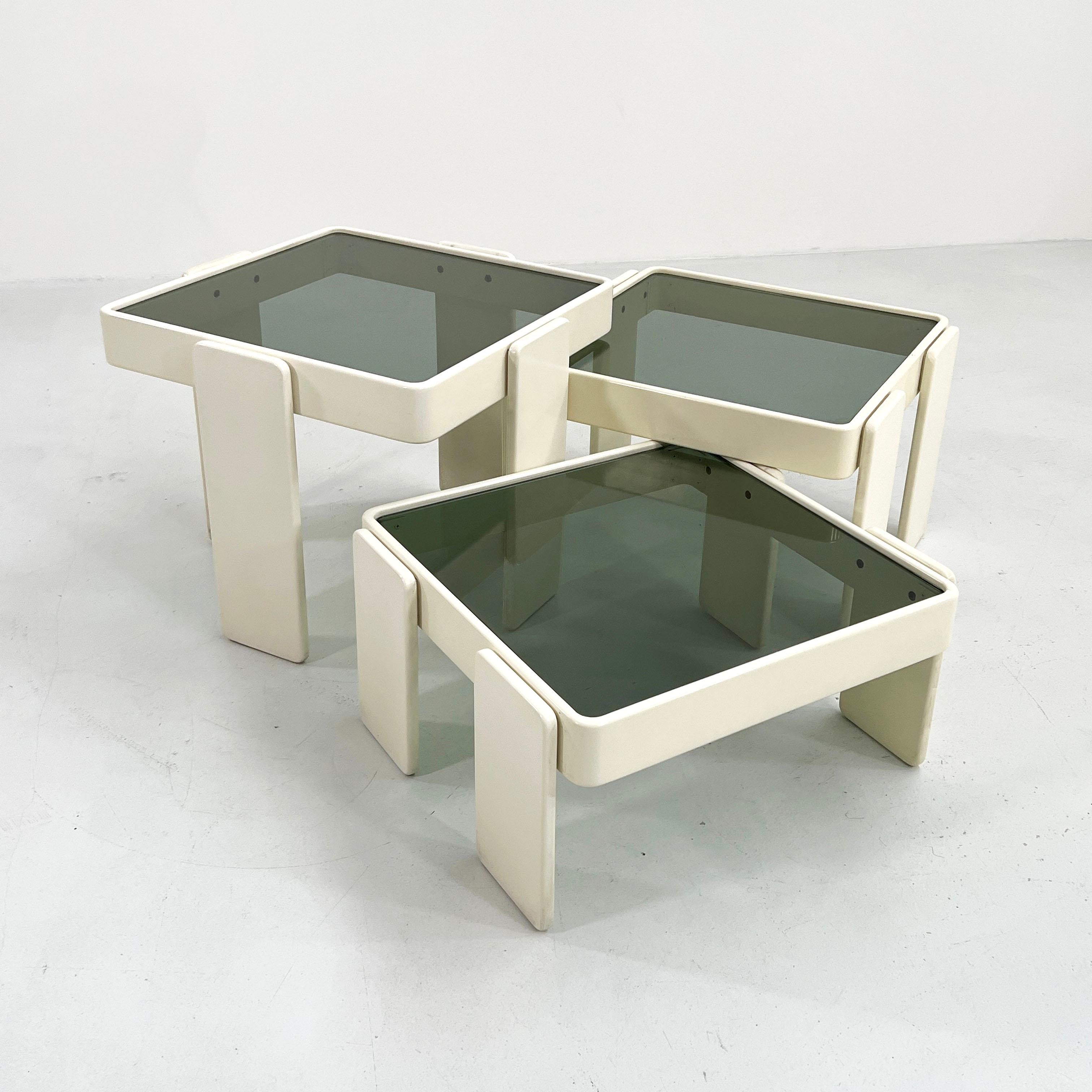Designer - Gianfranco Frattini
Producer - Cassina 
Model - Nesting Tables
Design Period - Seventies
Measurements - Width 58 cm x Depth 58 cm x Height 46 cm
Materials - Painted Wood, Glass
Color - White, Smoke
Light wear consistent with age