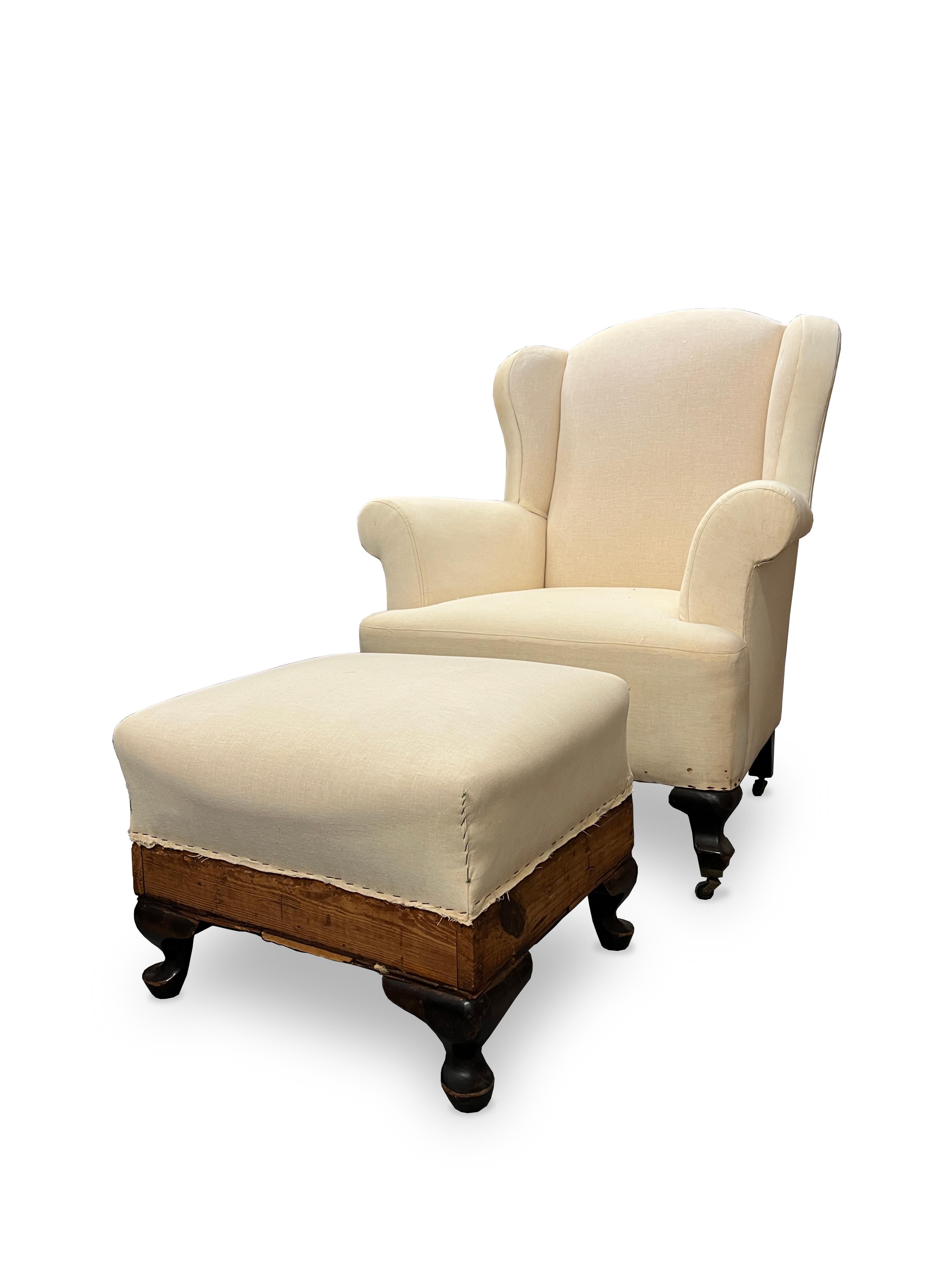 Set of wingback chair upholstered in white fabric paired with upholstered ottoman. This American style armchair has a high back, shaped arms and a cushion seat. These comfortable and stylish pieces look amazing in any setting. The striking large
