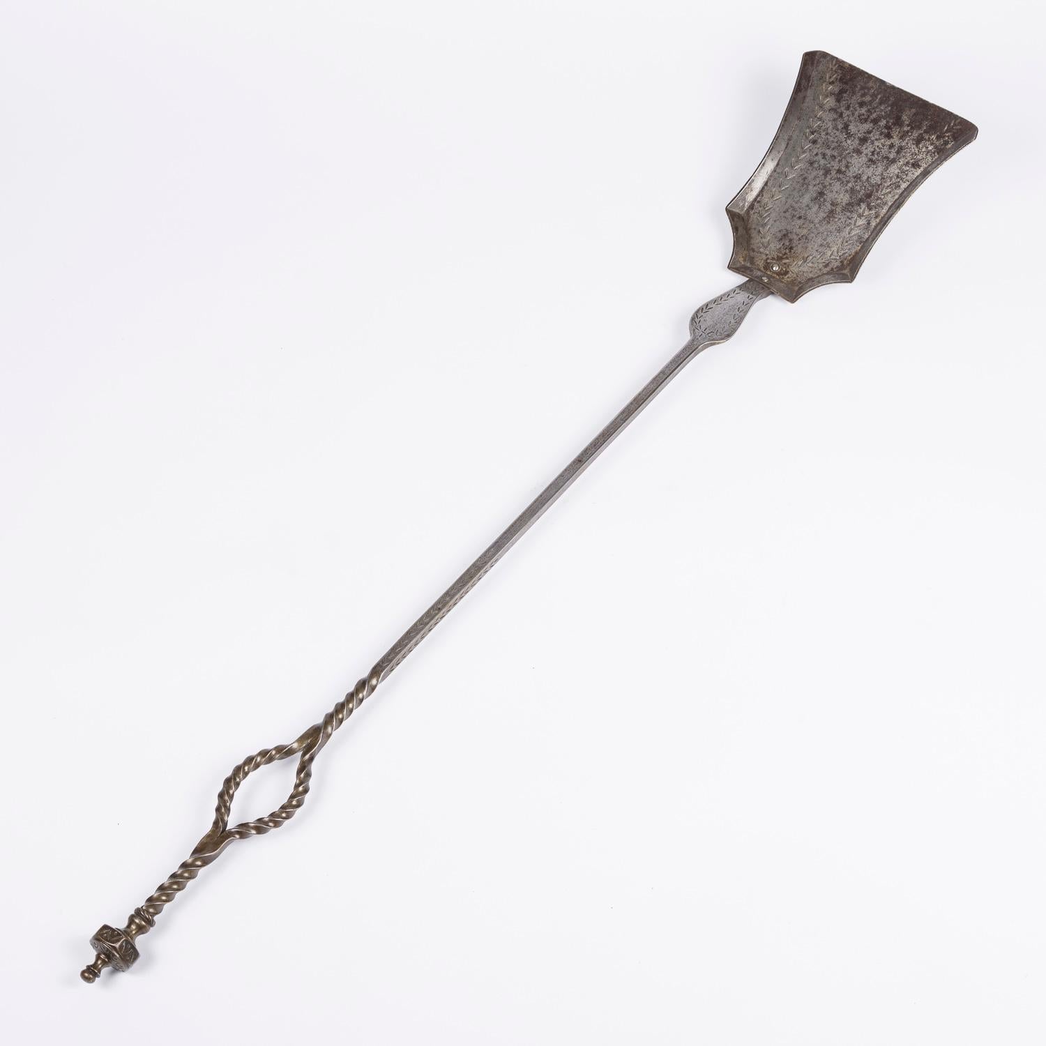 A set of French late 19th century wrought iron fire tools, comprising of a shovel and tongs.

Length of tongs: 39 inches - 99 cm.

length of shovel: 38 1/2 inches - 98 cm.