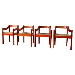 Set of x2 Original Red Stained Carimate Carver Chairs by Vico Magistretti
