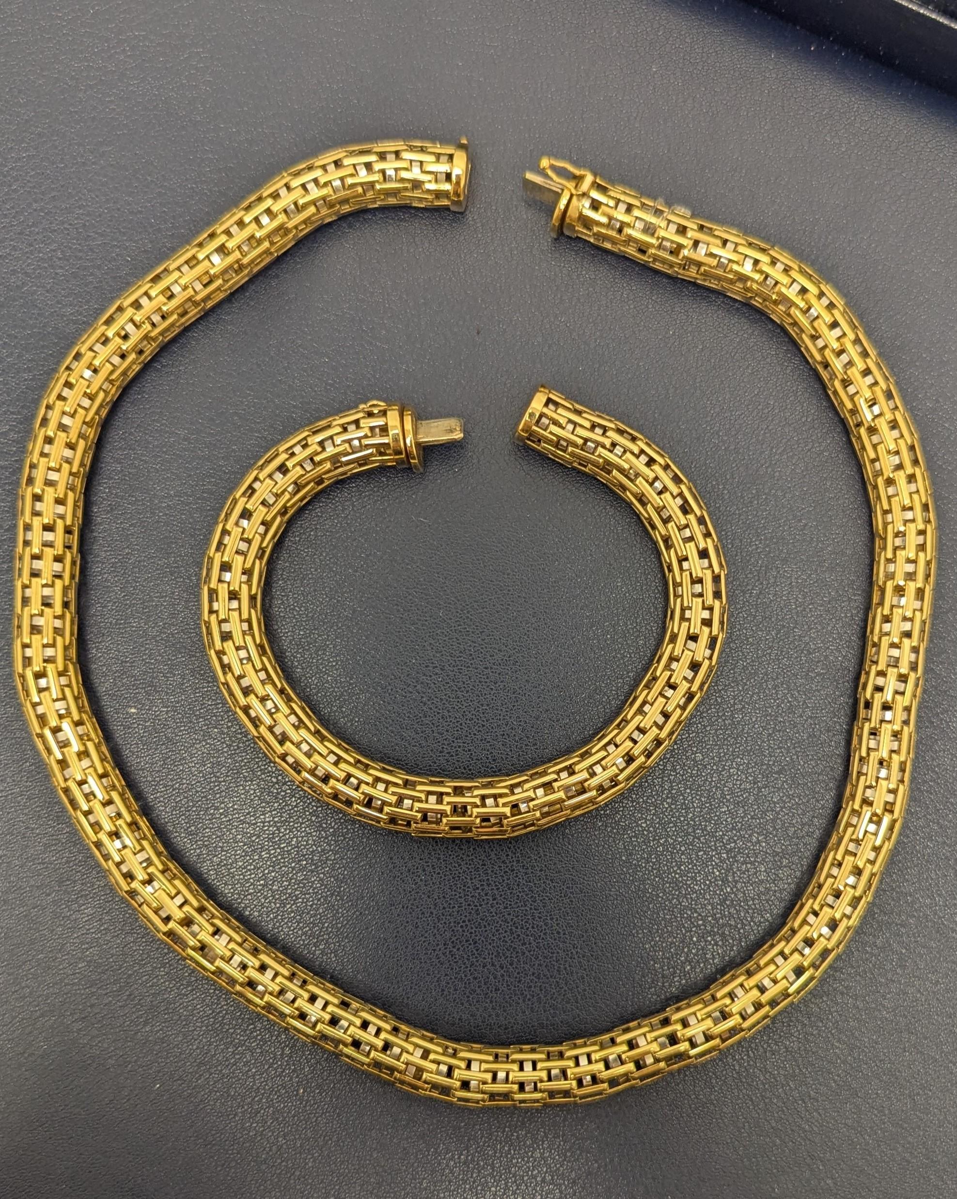 This delicate piece links yellow and white gold together to either be worn as a longer necklace or separately as a bracelet and necklace set by combining or taking apart the two individual pieces. 