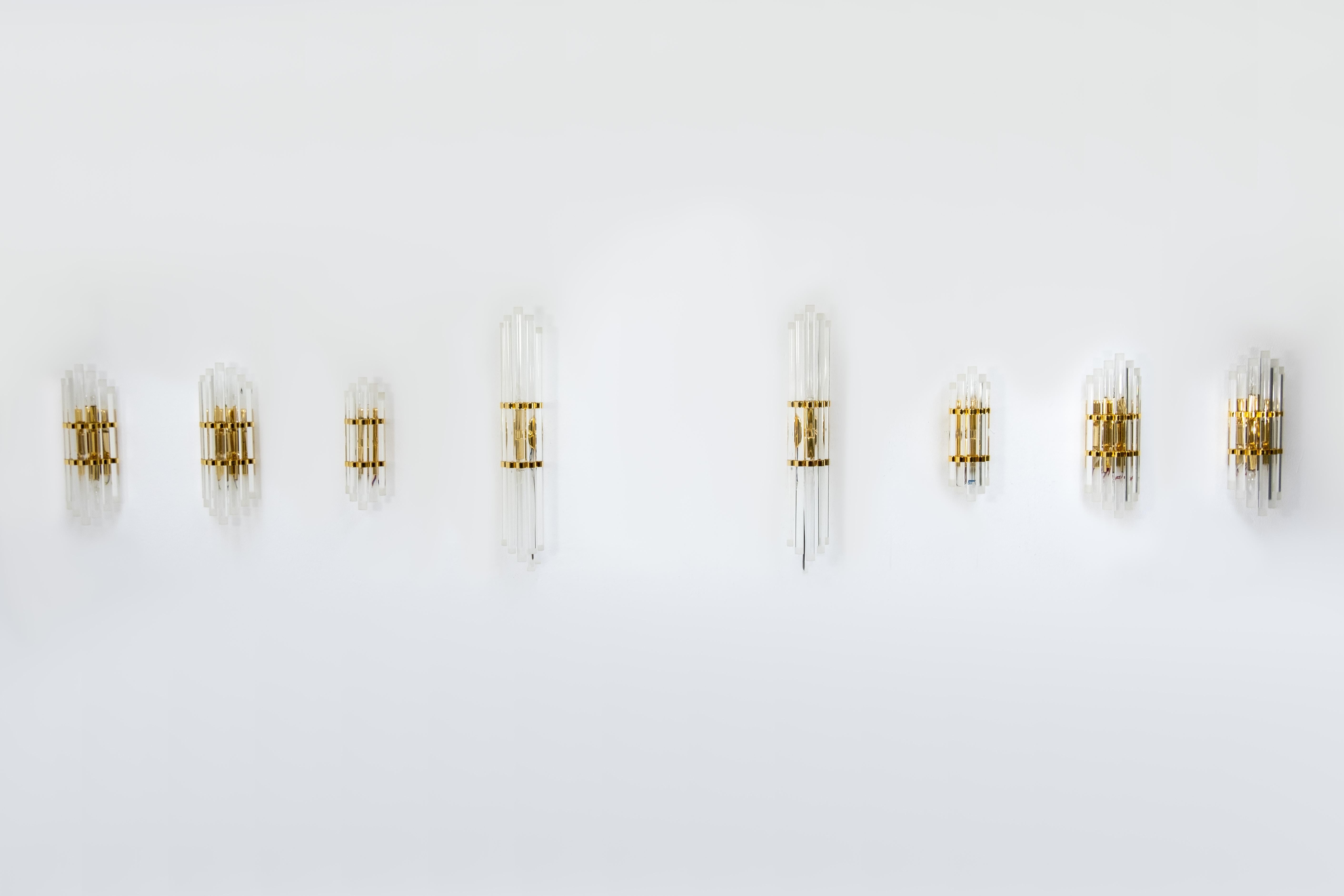 Murano Glass Set of Eight Venini Brass Wall Lamps