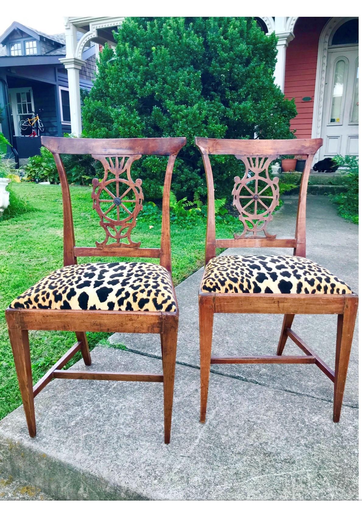 In leopard or cheetah velvet. Both in hand carved and peg constructed. Directoire frames and of slight Klismos form. Pretty well untouched (other than new leopard velvet seat covering), no later screws or glue blocks and still all four are