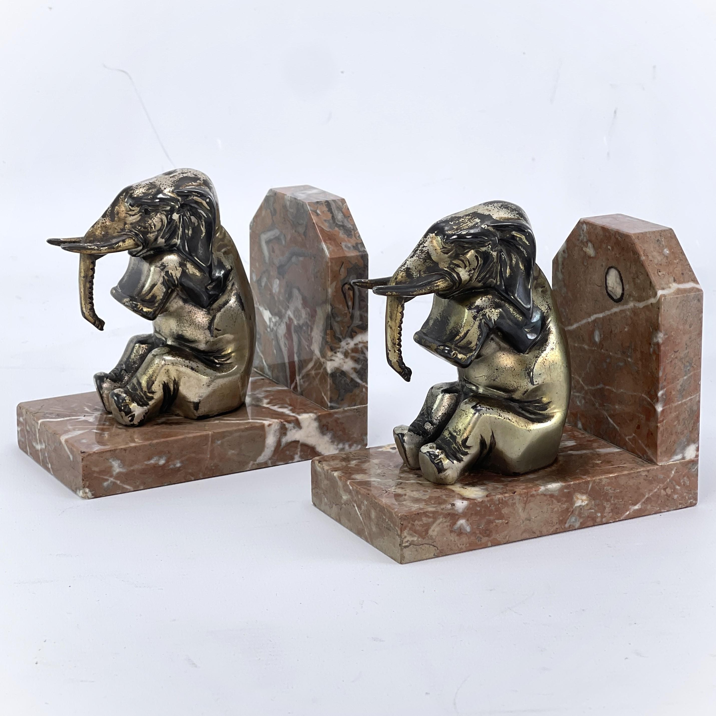 Art Deco elephant bookends - 1930s

These beautiful elephant bookends are originals from the 1930s and are typical of the Art Deco period.

Each of the cleaned items wheights 1.25 kg / 2.76 lbs.
